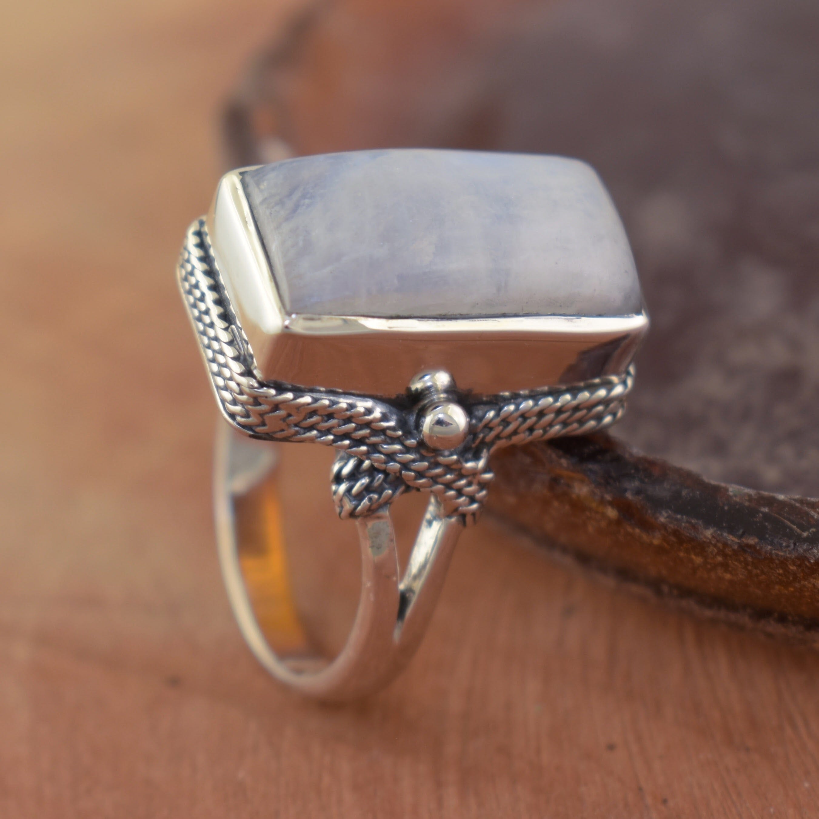 rope detailed sterling silver ring featuring a Rainbow Moonstone Bezel set stone