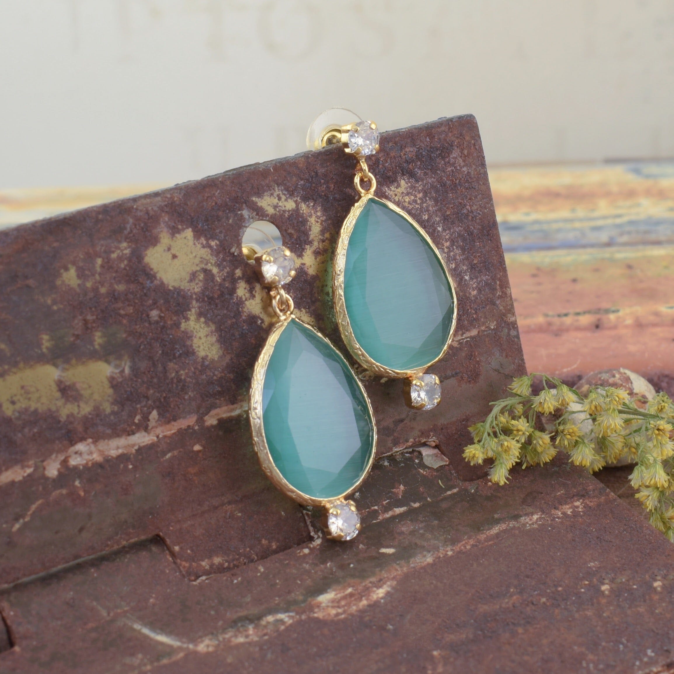 Faceted glass earrings bezel set