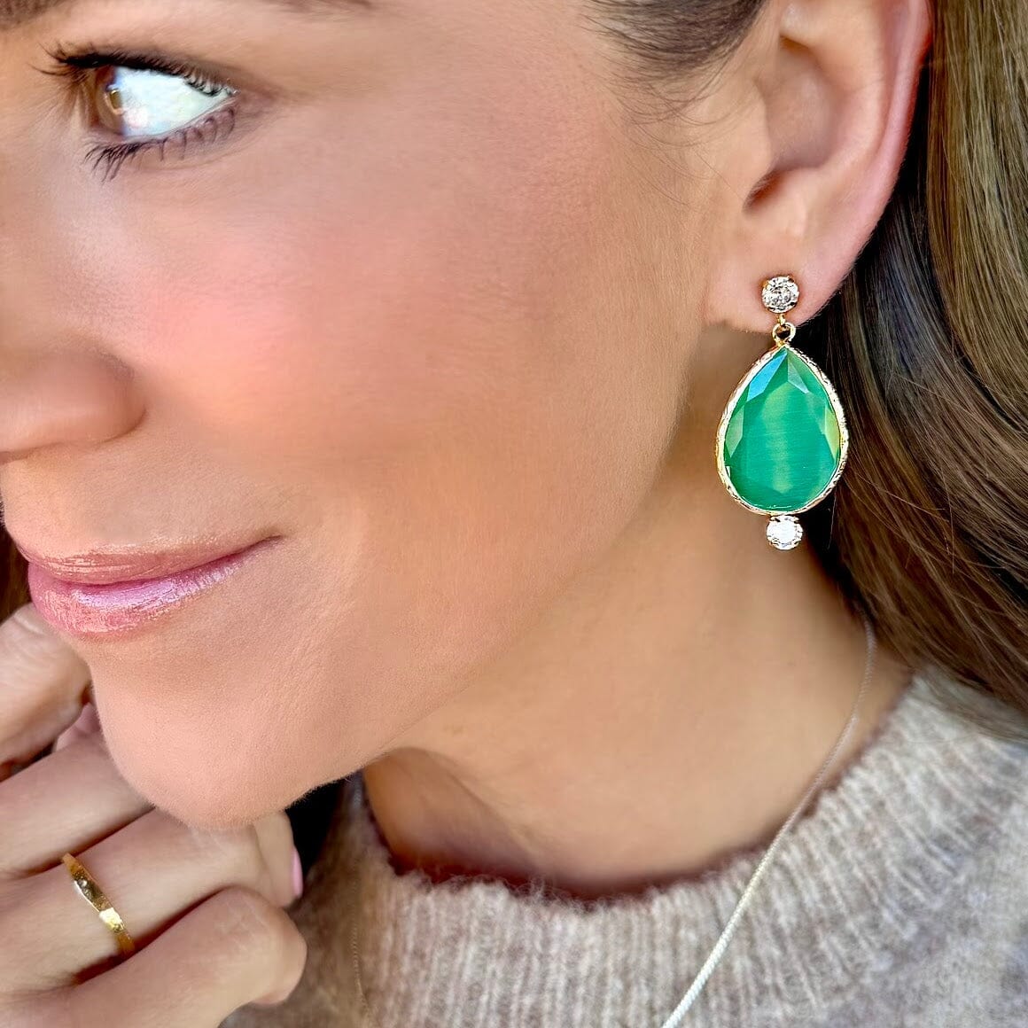 green faceted glass statement earrings