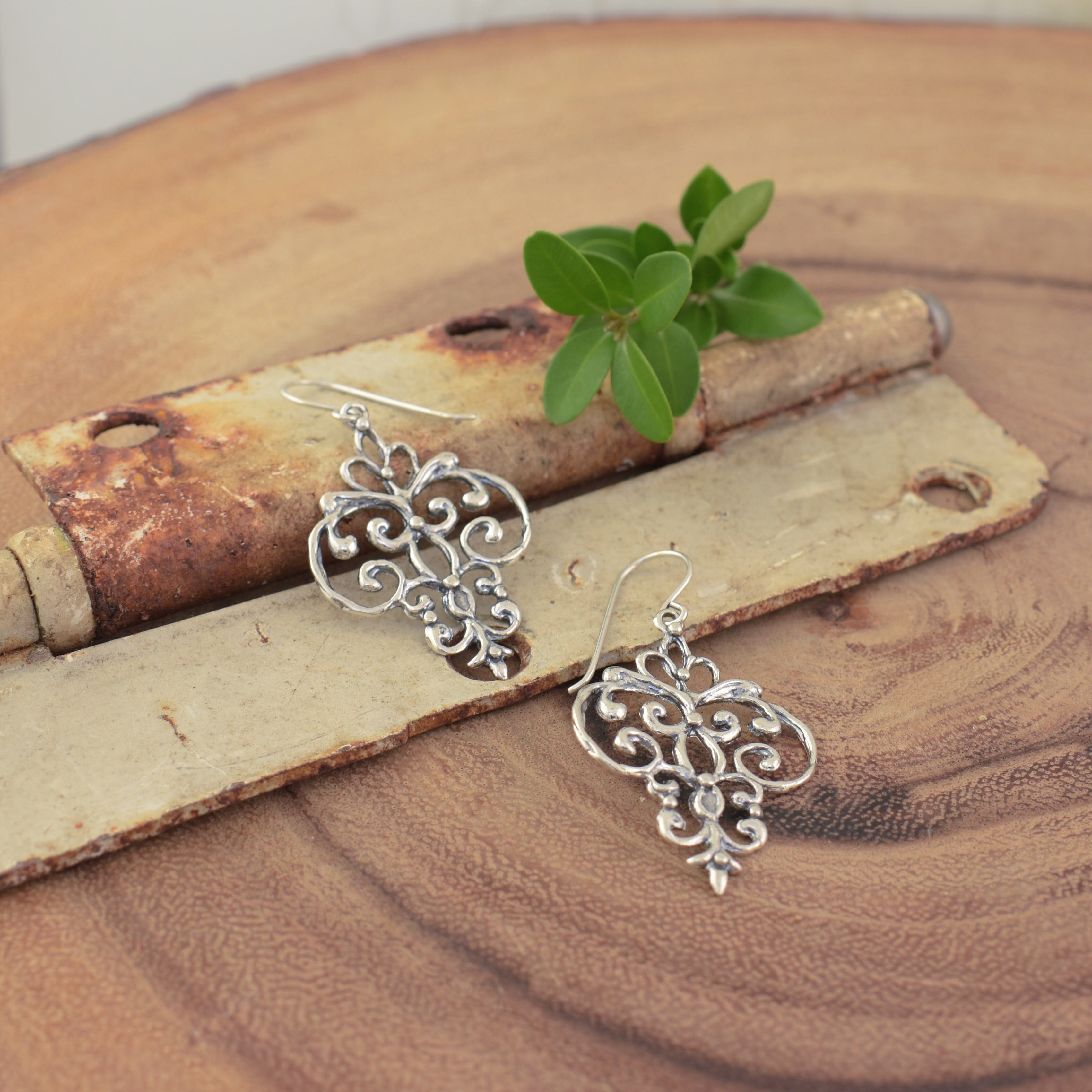 Designer earrings with hook backs