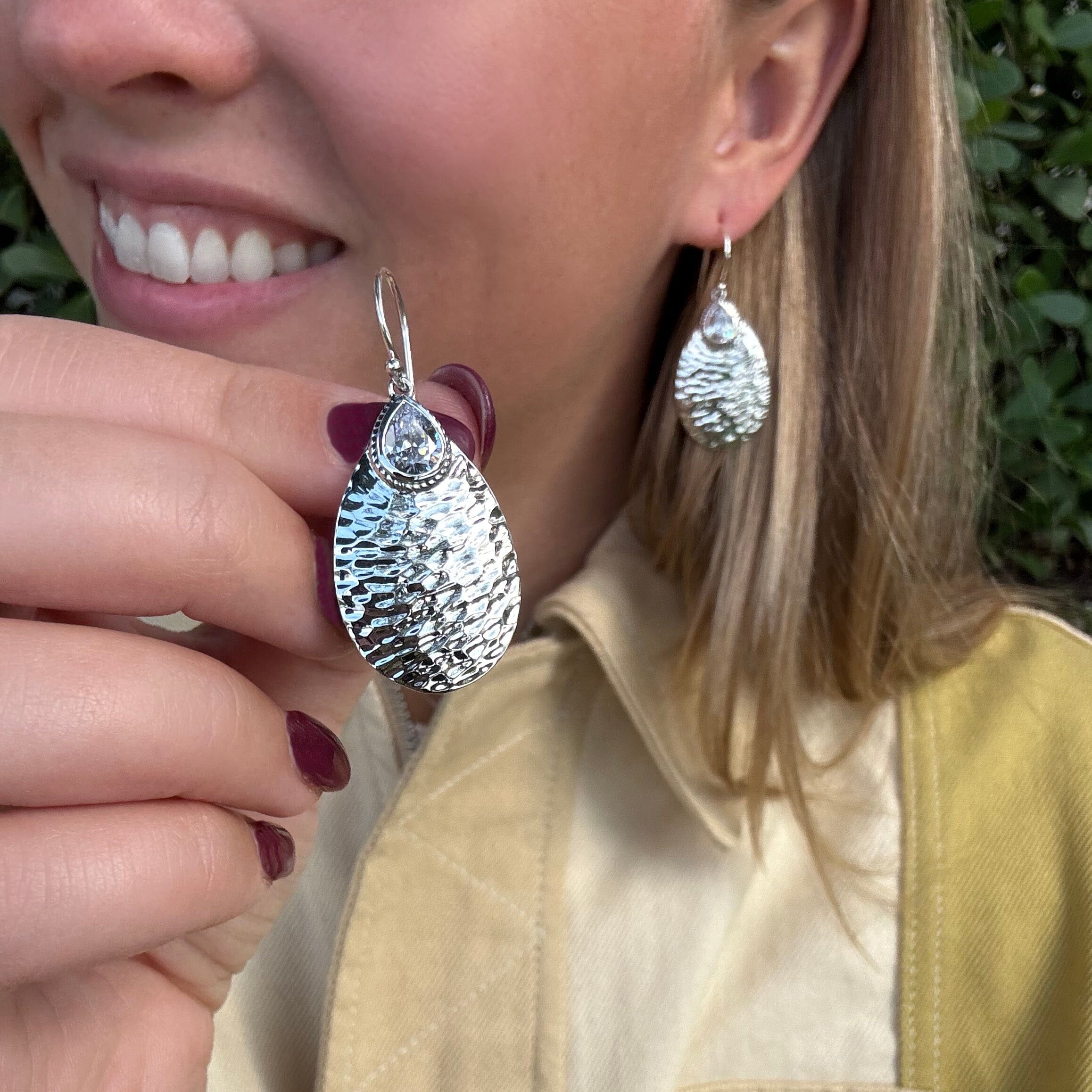 statement cz teardrop earrings with a hammered finish