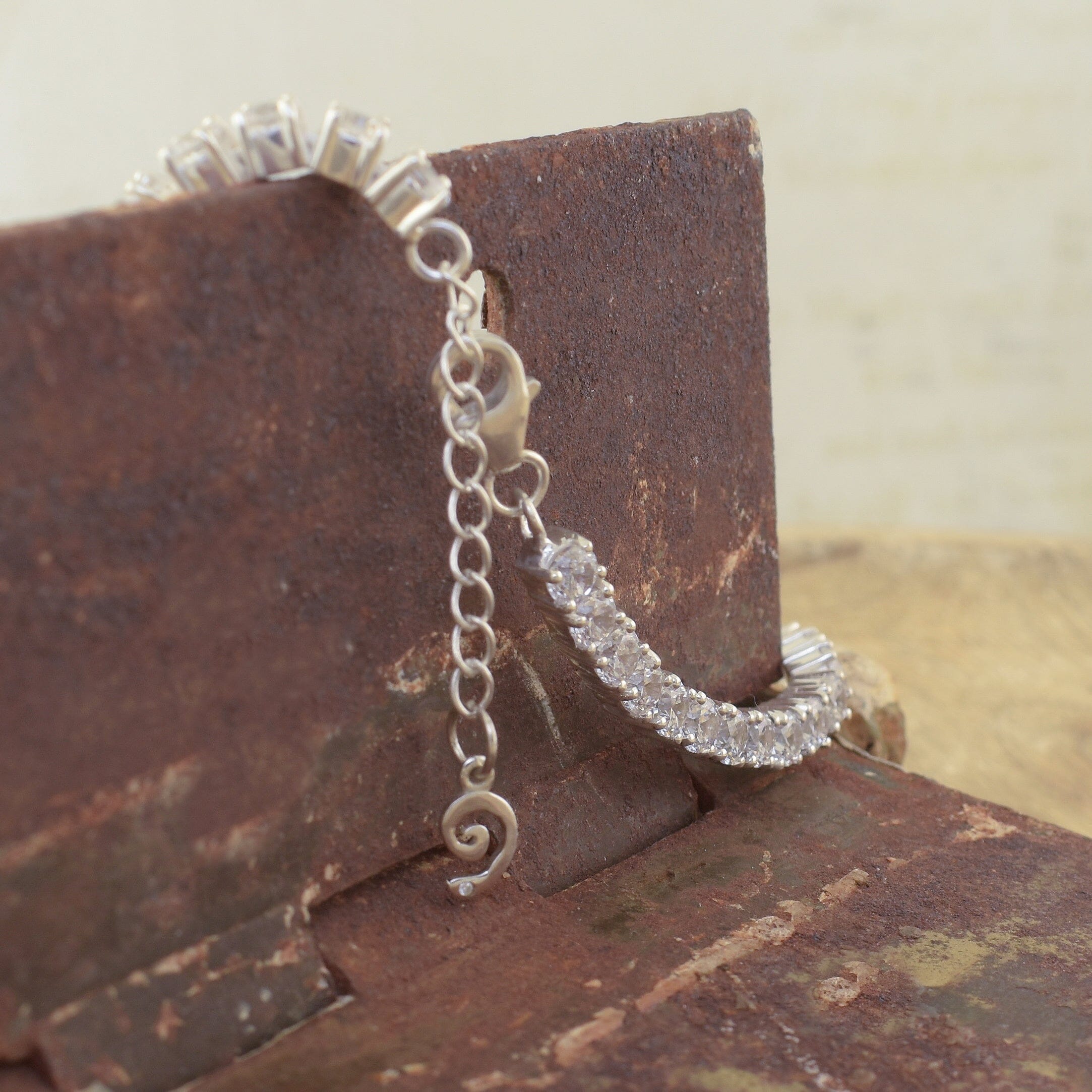 sterling silver bracelet with prong set clear stones