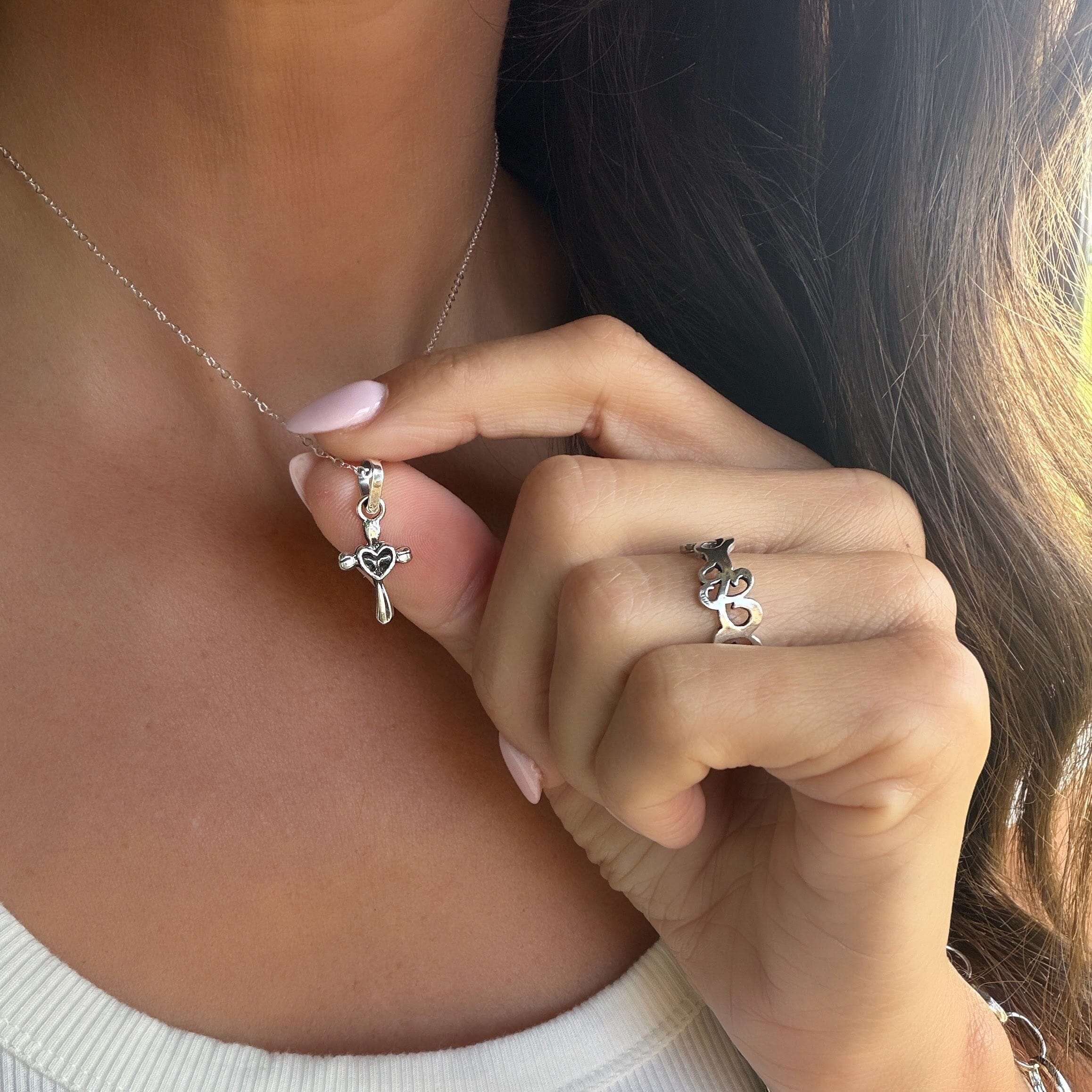 sterling silver cross necklace inspired by a Corinthians bible verse