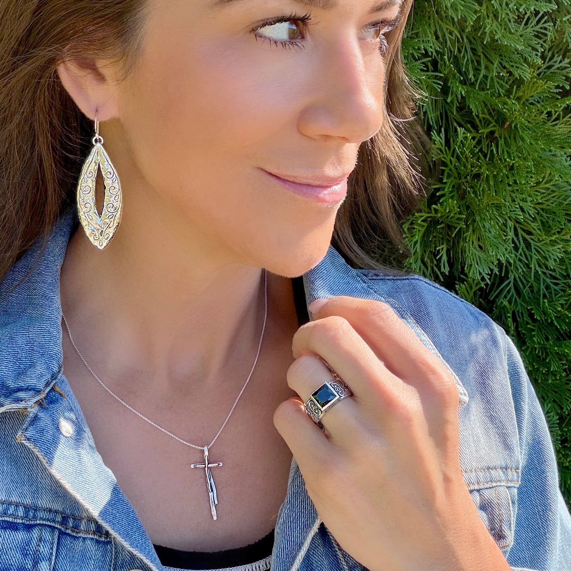 The Socialite Ring styled with The Mercer Earrings and It Is Finished Necklace
