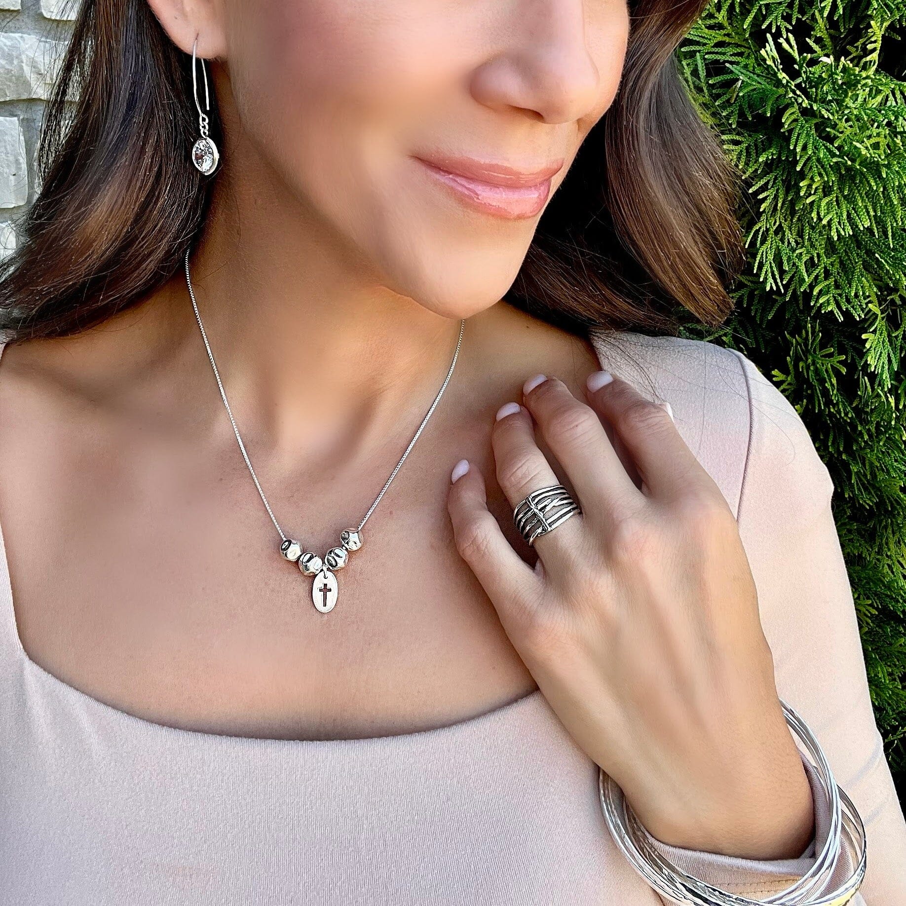 The rock necklace paired with the shine like silver earrings and through it all ring and the falls bangle