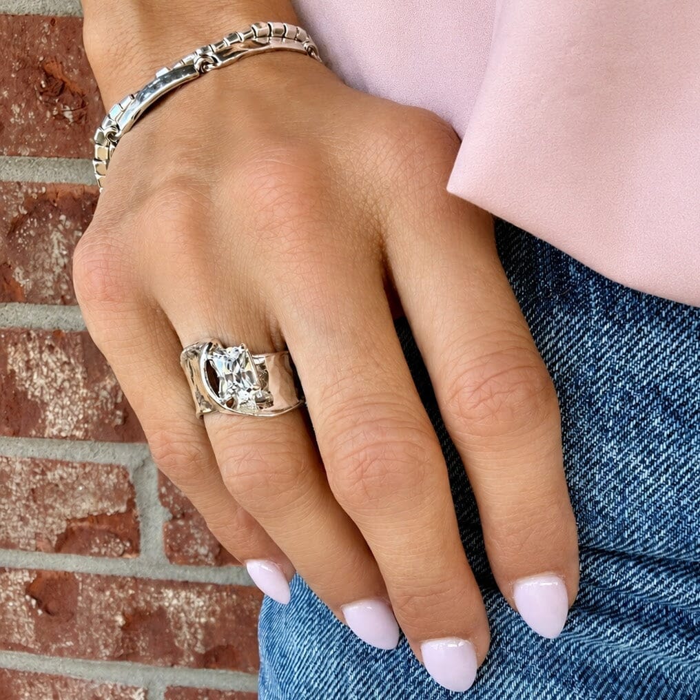 emerald-cut cz stone prong-set in handcrafted .925 sterling silver