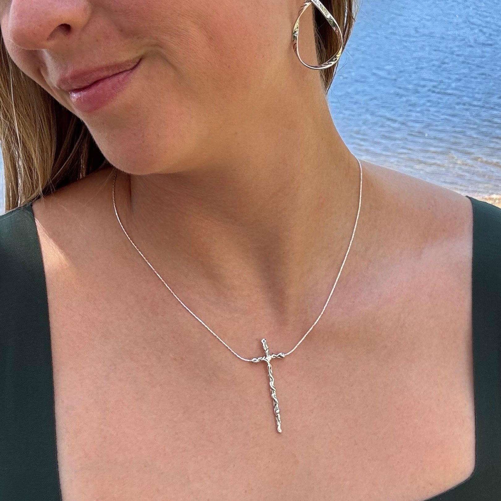 sterling silver cross necklace on a delicate sleek chain