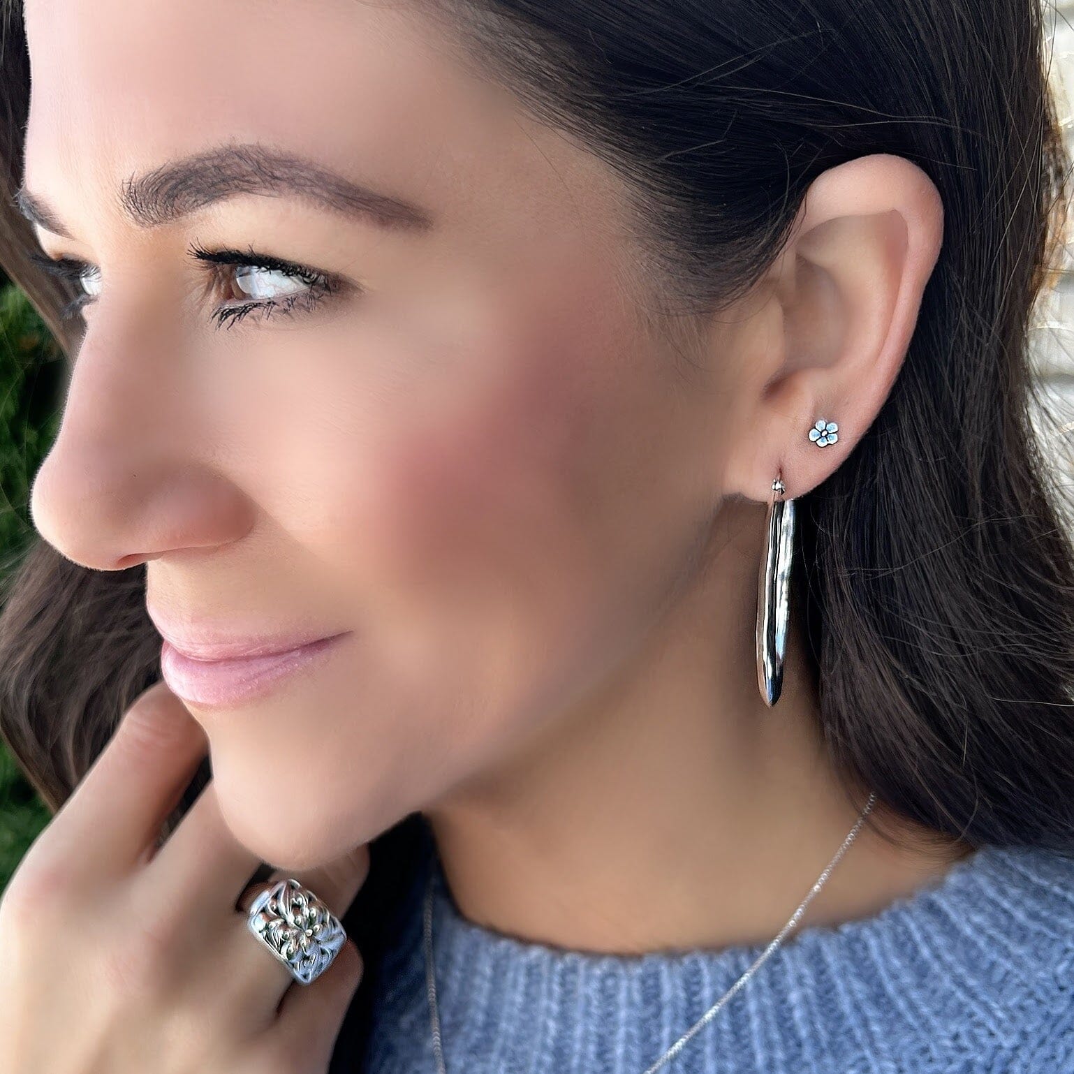 Sterling silver post back earrings paired with overtly oval earrings and Venice ring