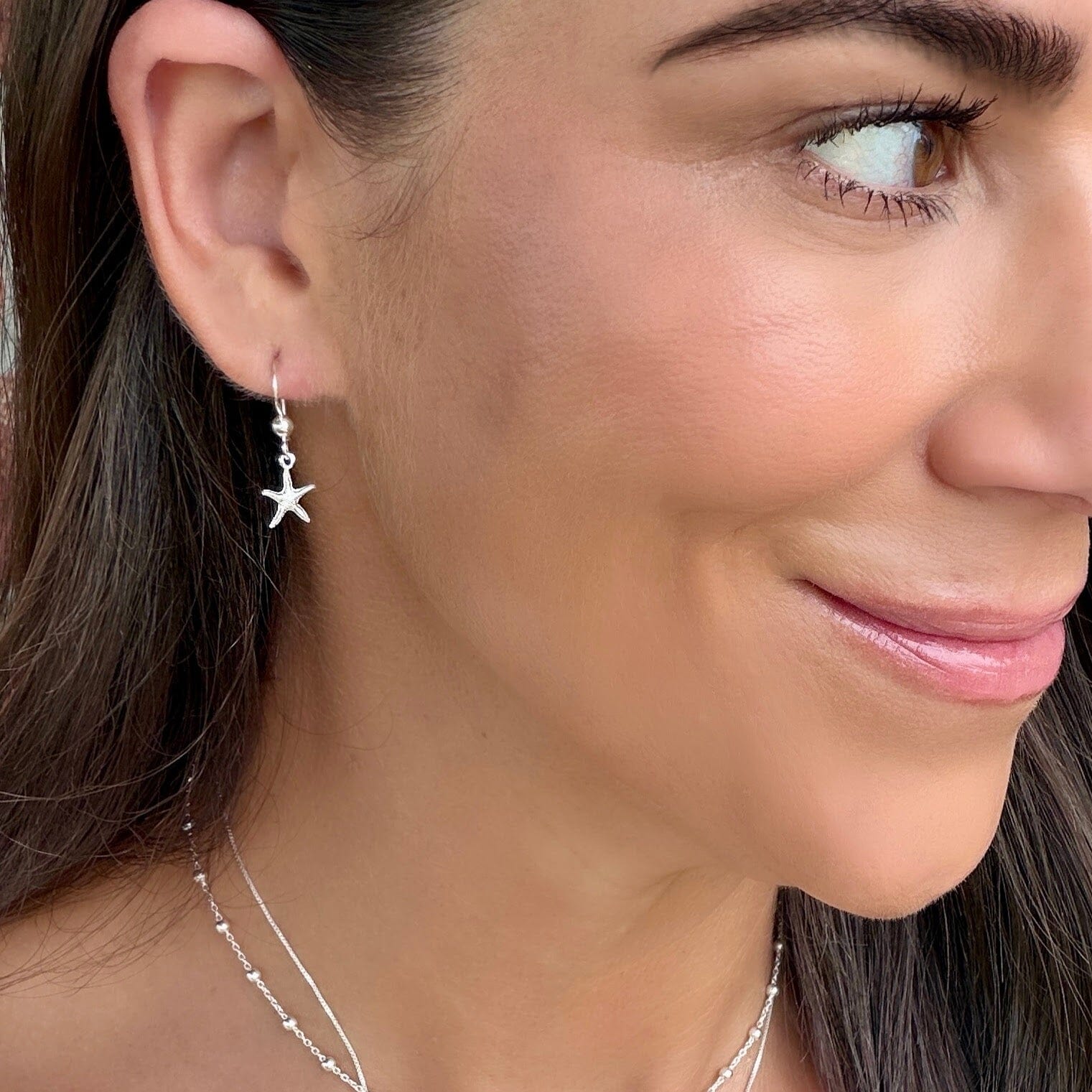 dainty starfish earrings in sterling silver
