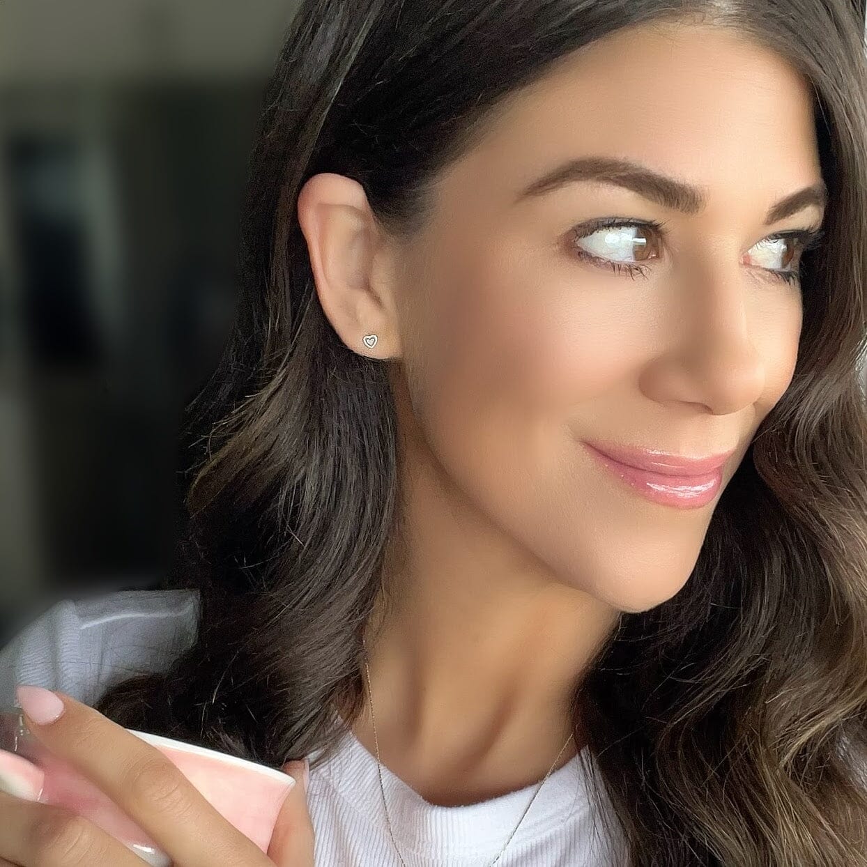 Tiny heart earrings with a post back