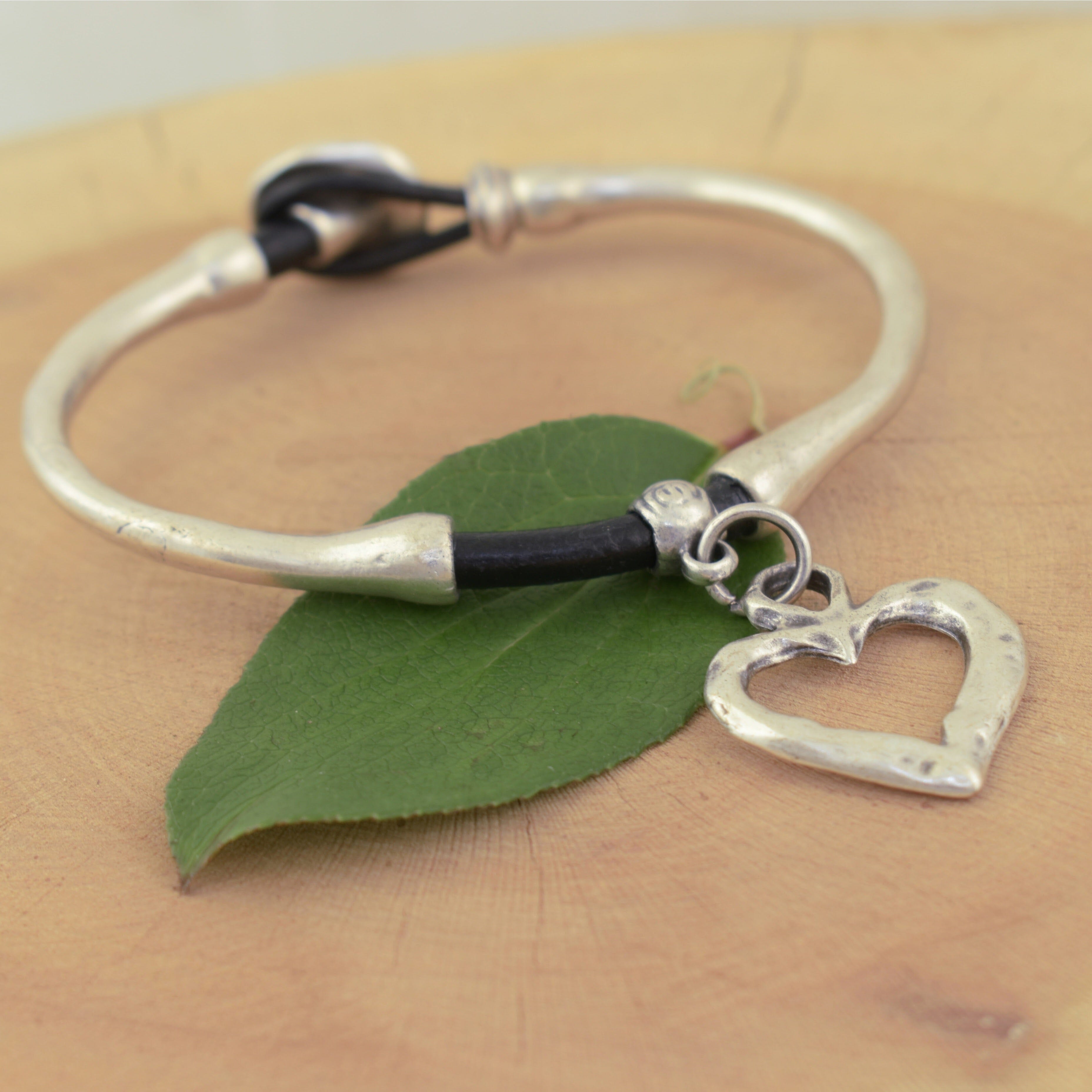 leather bound button closure bracelet