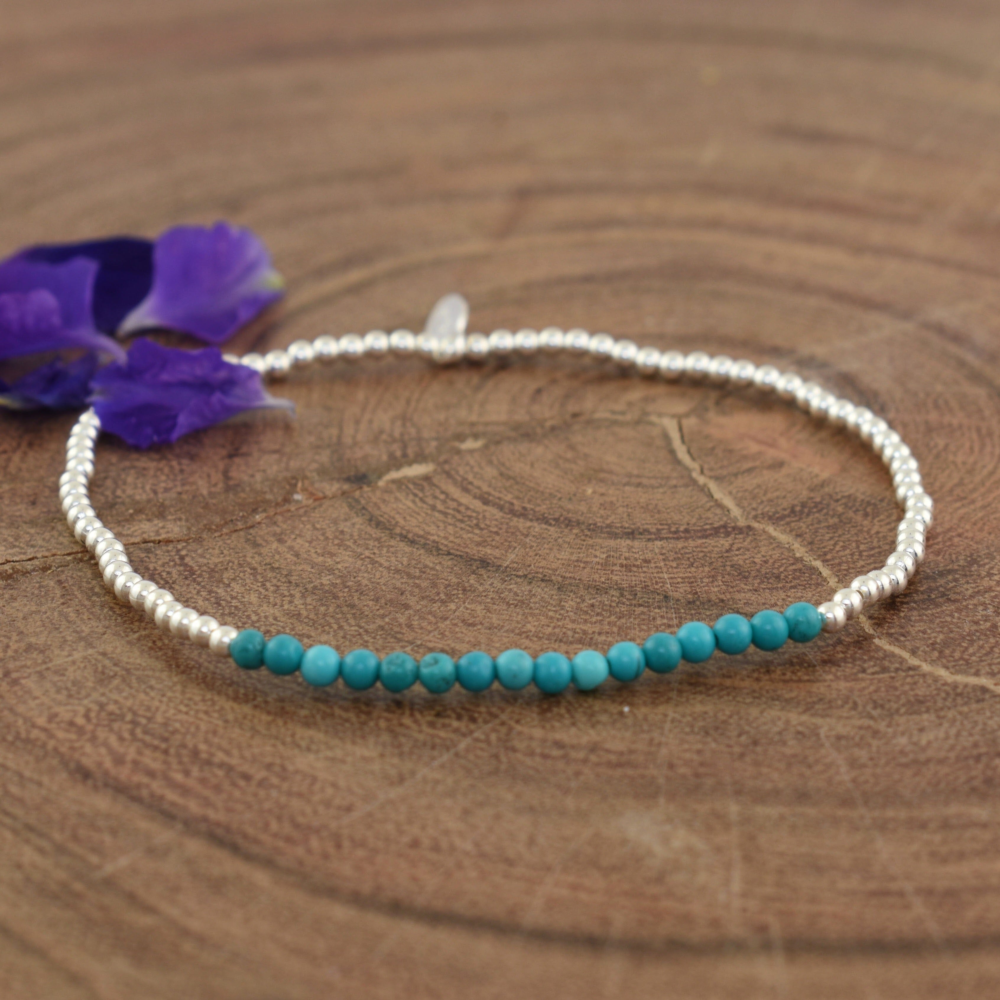 Sterling silver stretch bracelet with turquoise accent beads