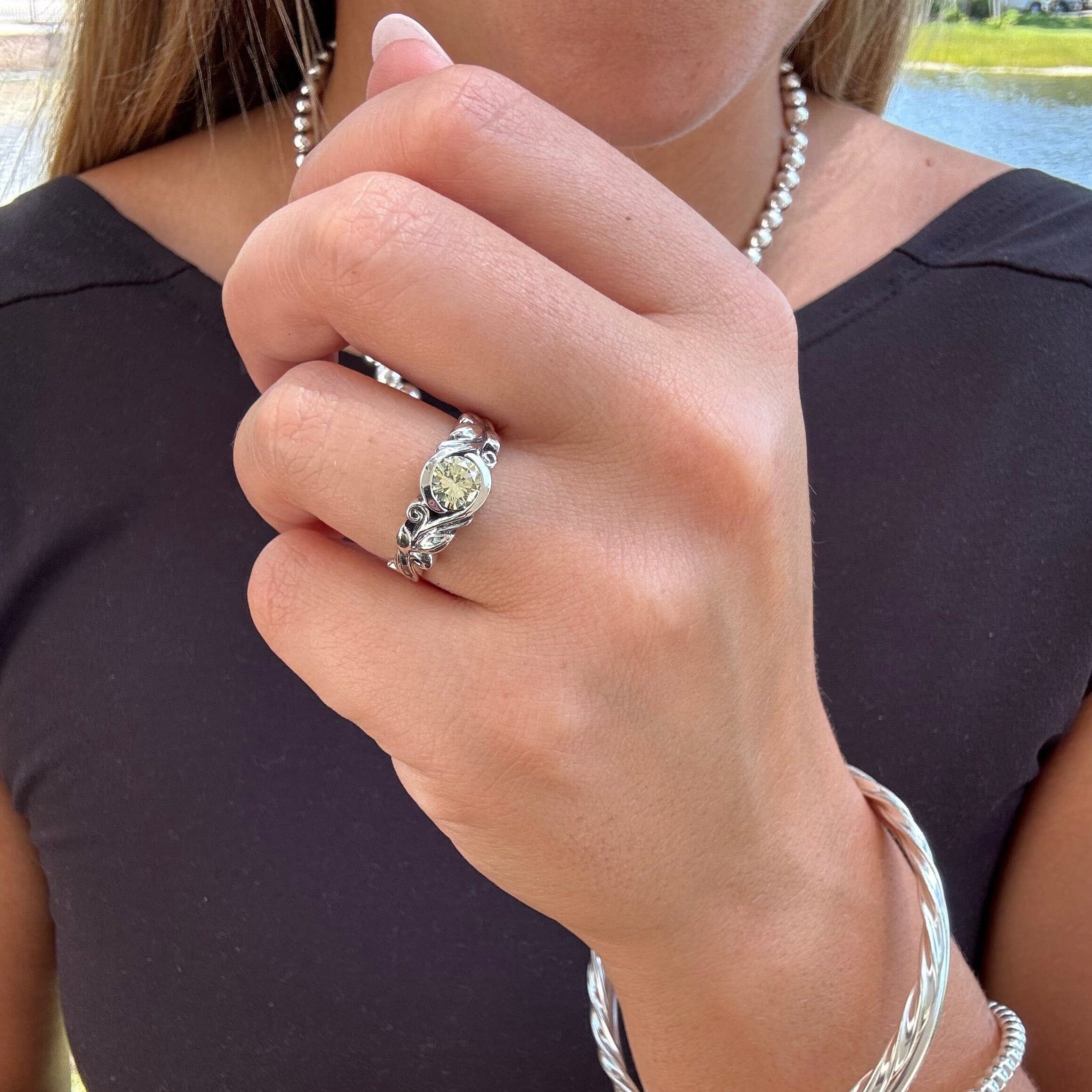 Bezel set Peridot stone