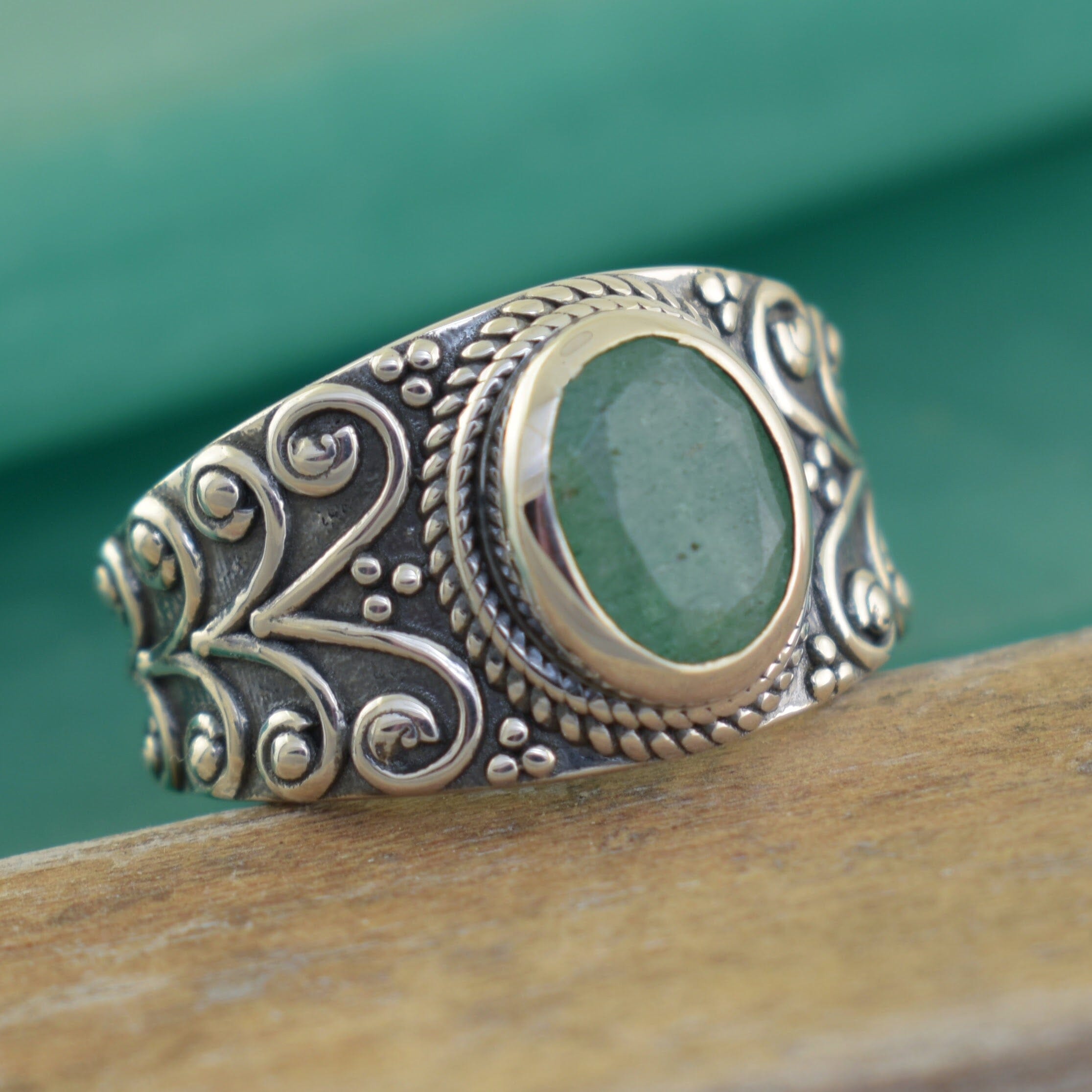 gem stone ring with a decorative band