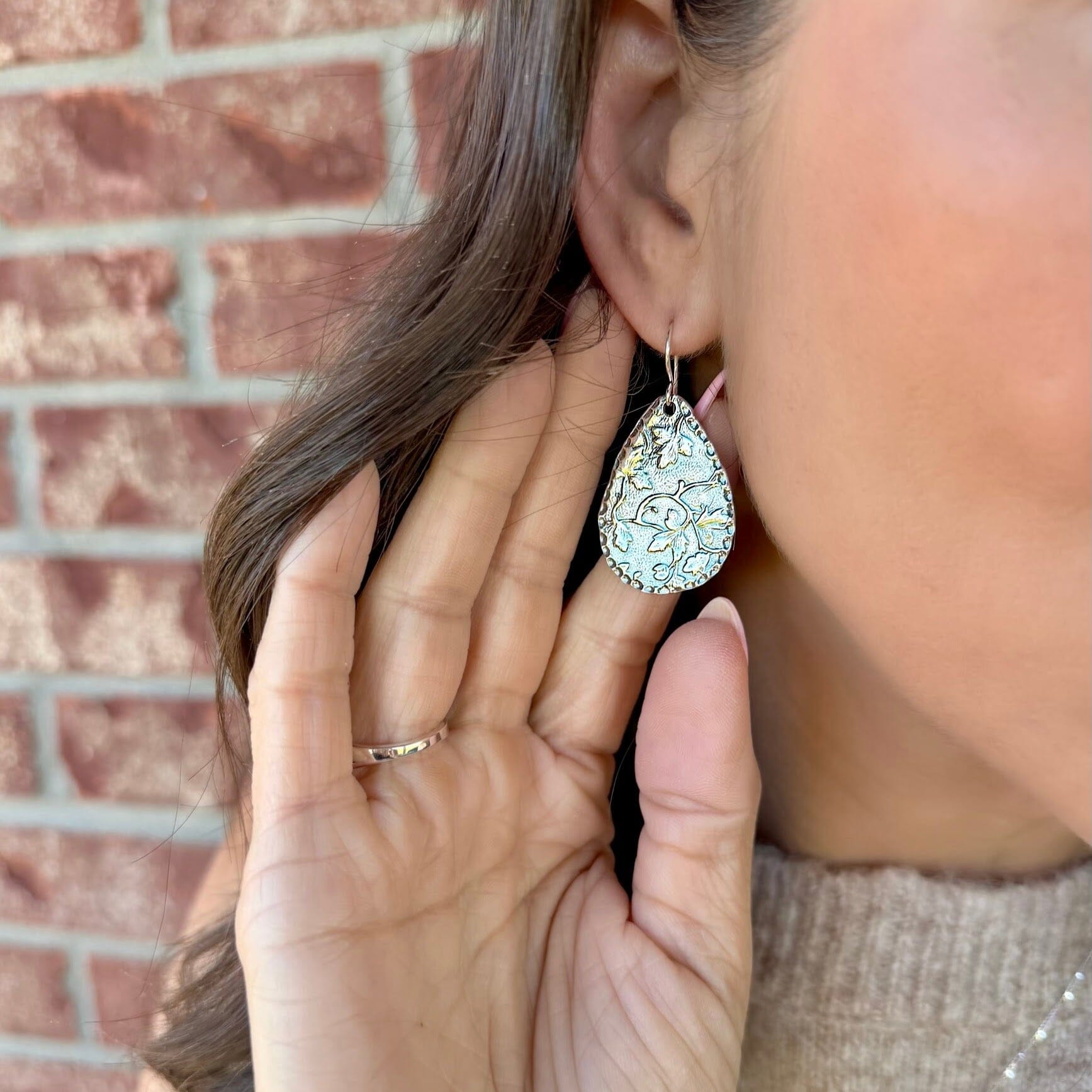 Sterling silver drop shaped earrings