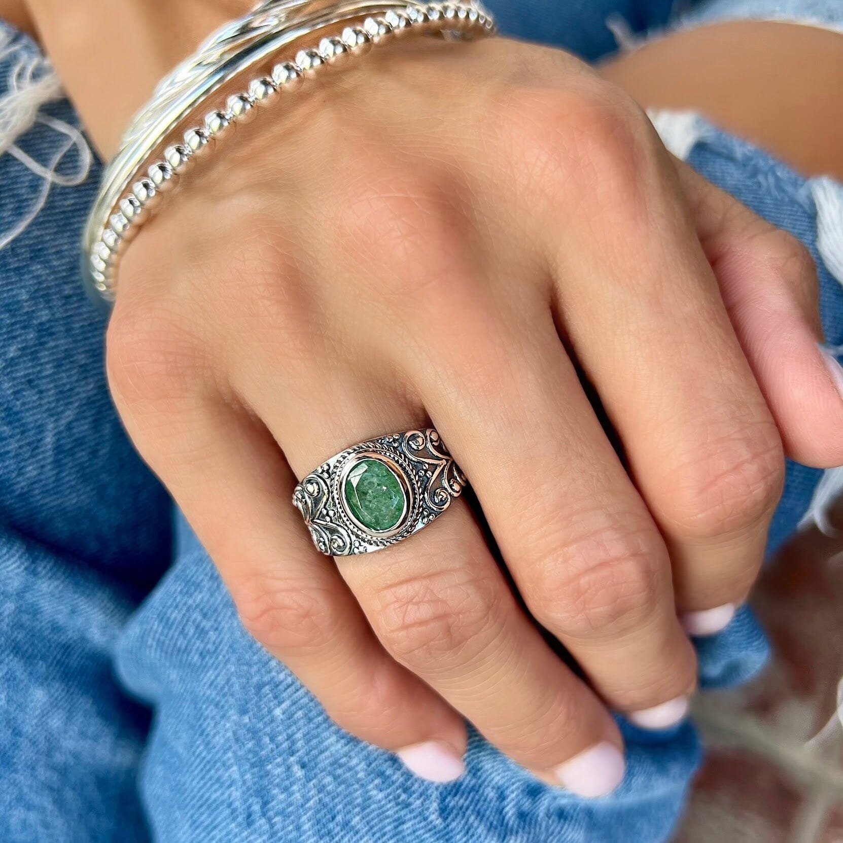 oval tanzurine quartz stone bezel set in designer sterling silver