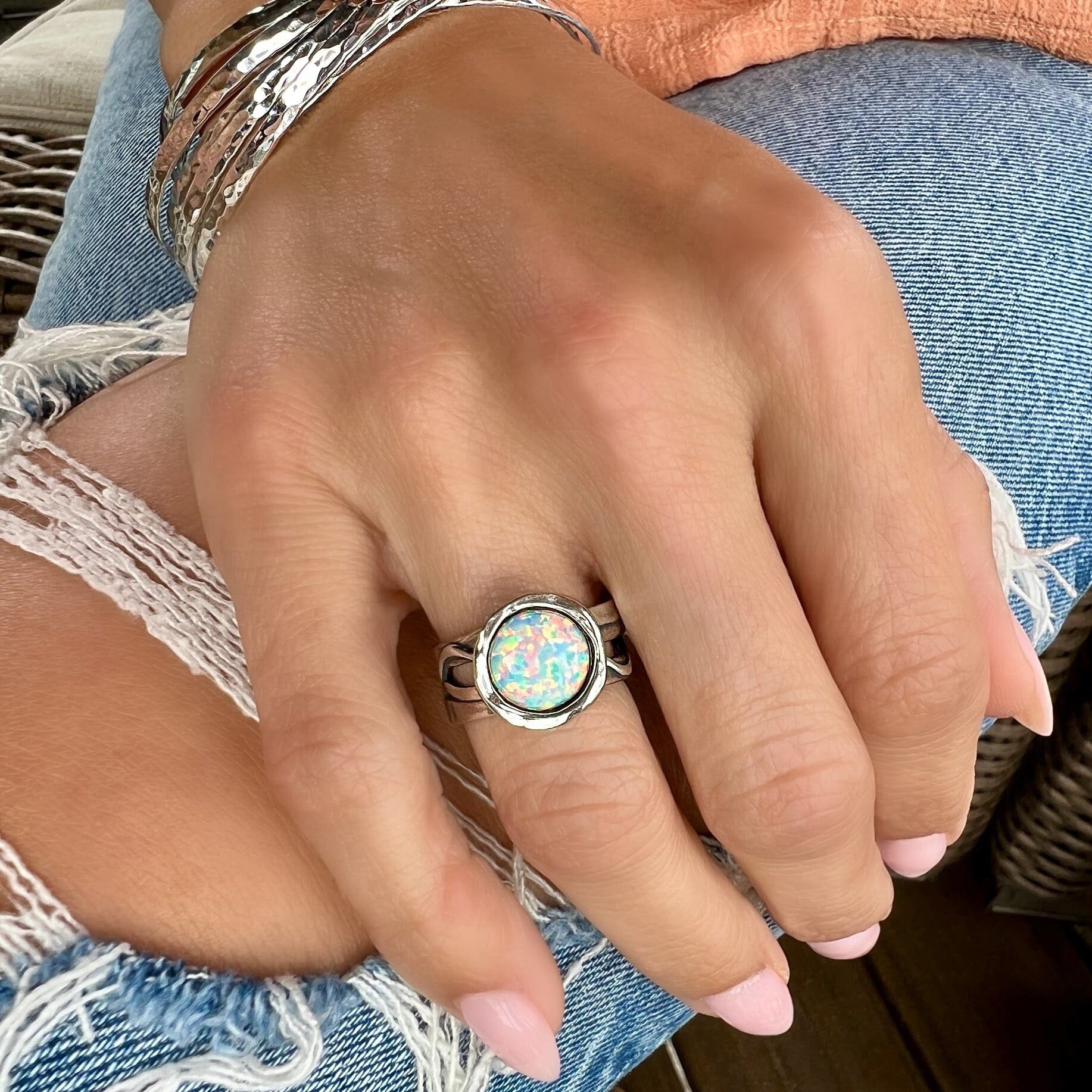 detailed sterling silver band with a statement opal stone 