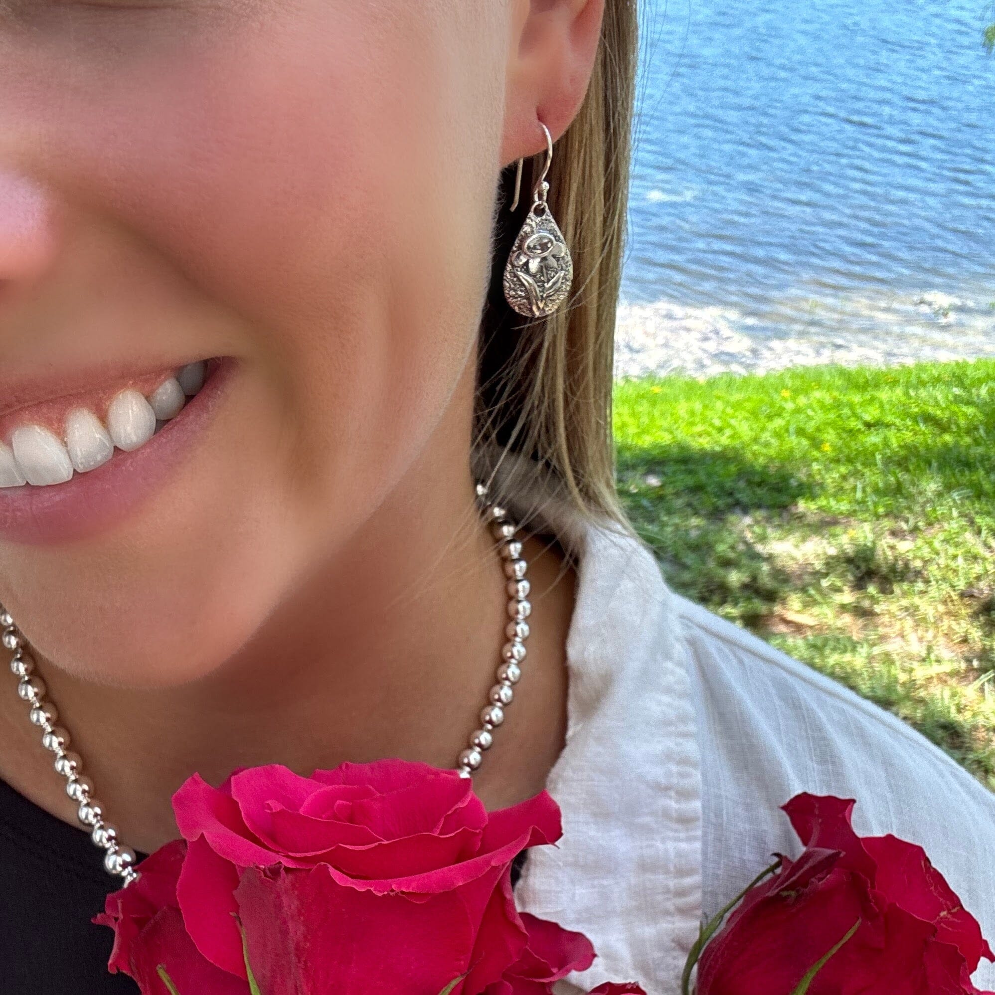 Wildflower wink earrings paired with the Classic bead necklace