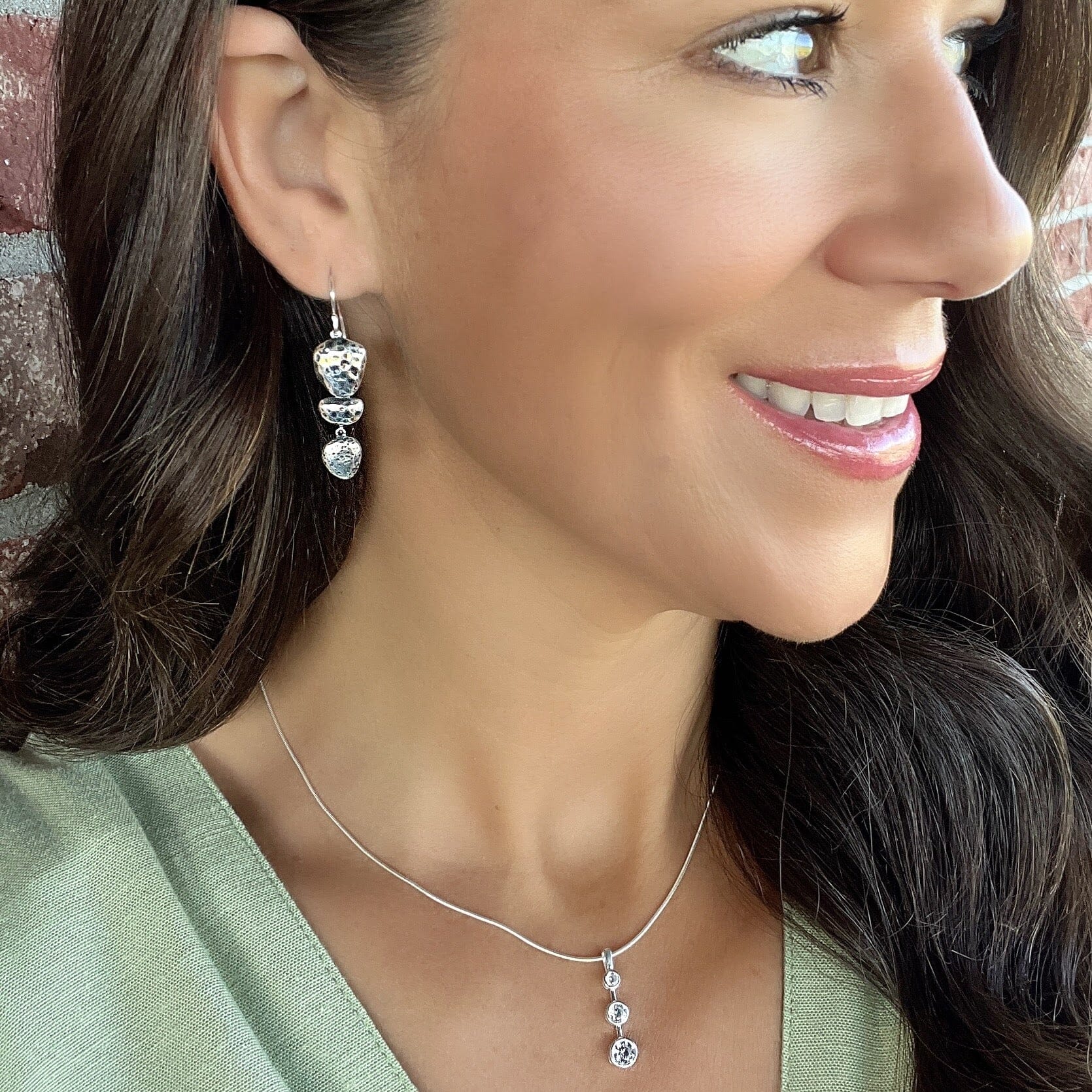 Bedrock hammered sterling silver earrings paired with I am necklace