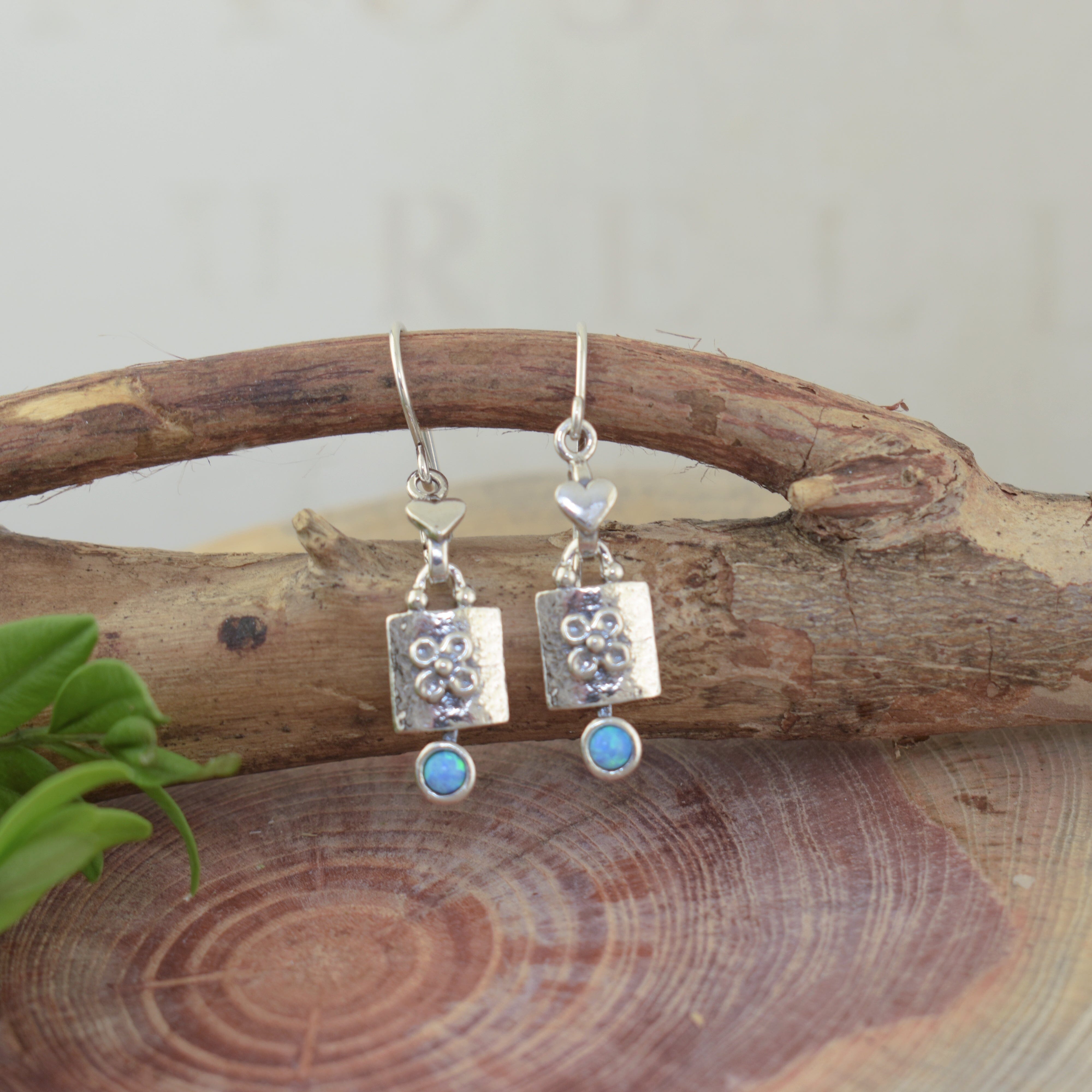 .925 sterling silver and recontructed earrings with heart and floral accents