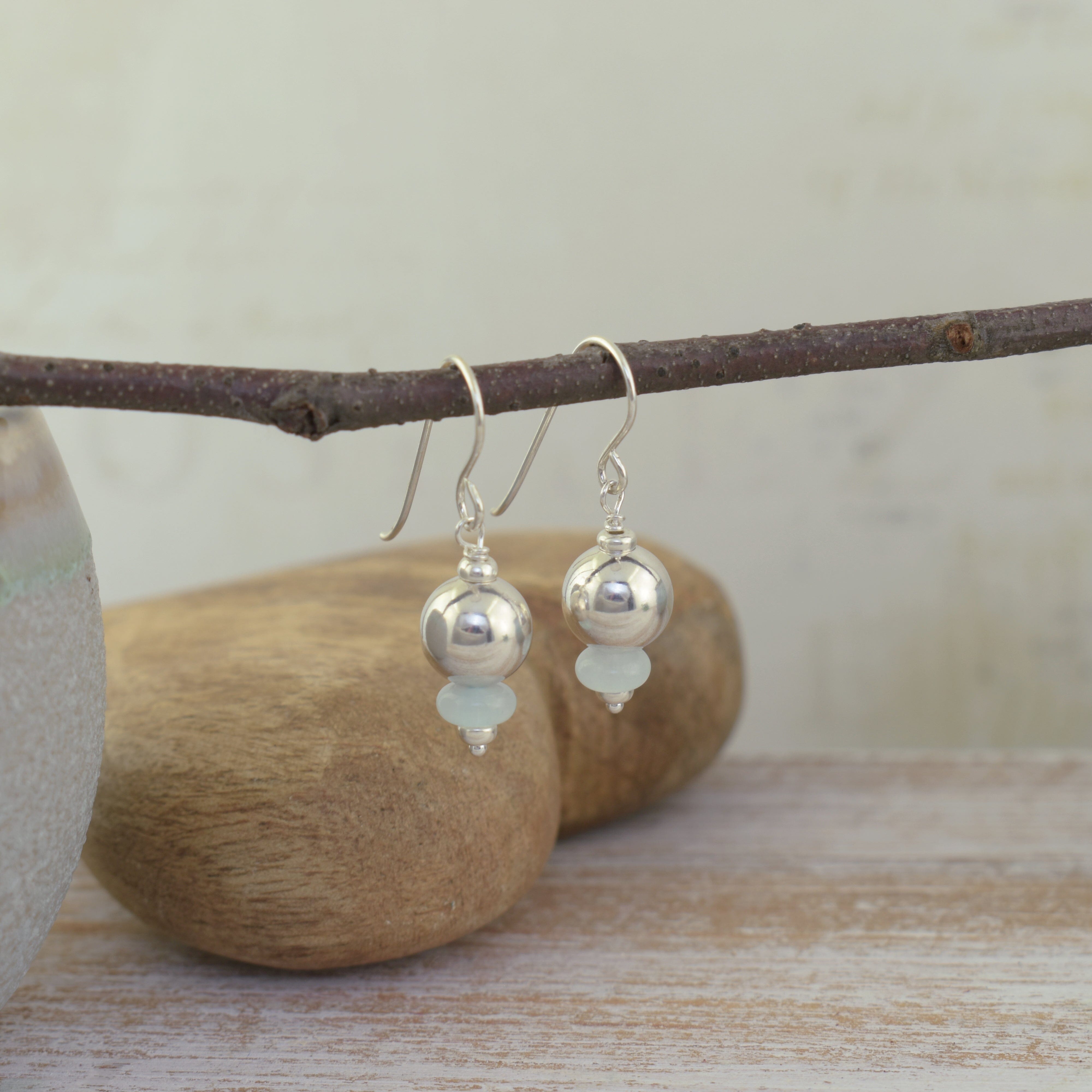 Beaded sterling silver earrings featuring blue jade bead