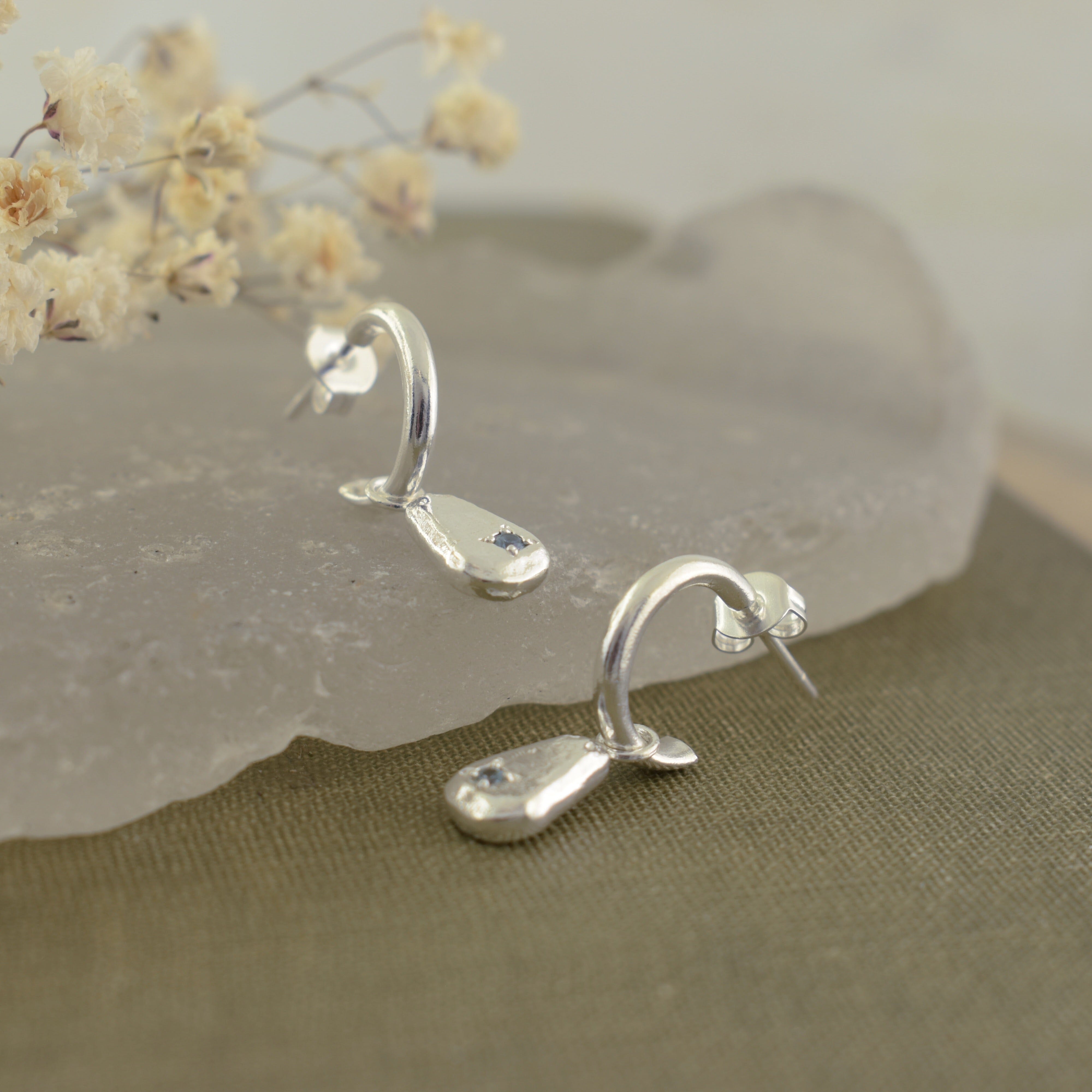 silver hoop earrings with a hammered dangle