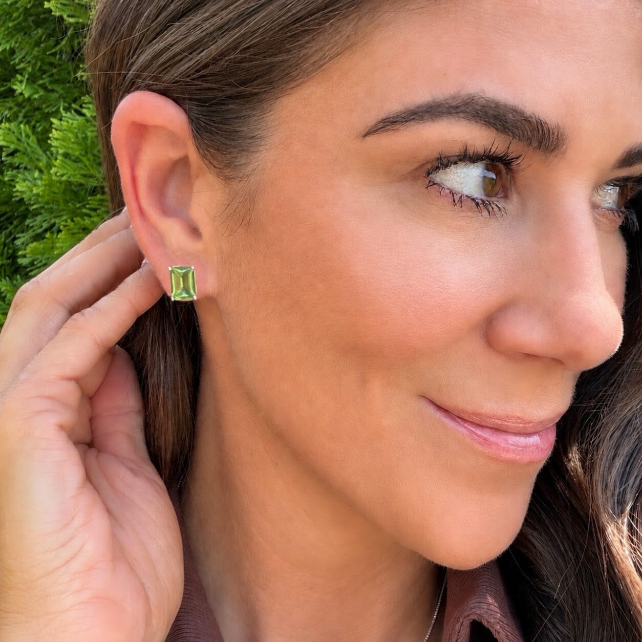 rectangular stud earrings featuring a color changing synthetic zultanite 