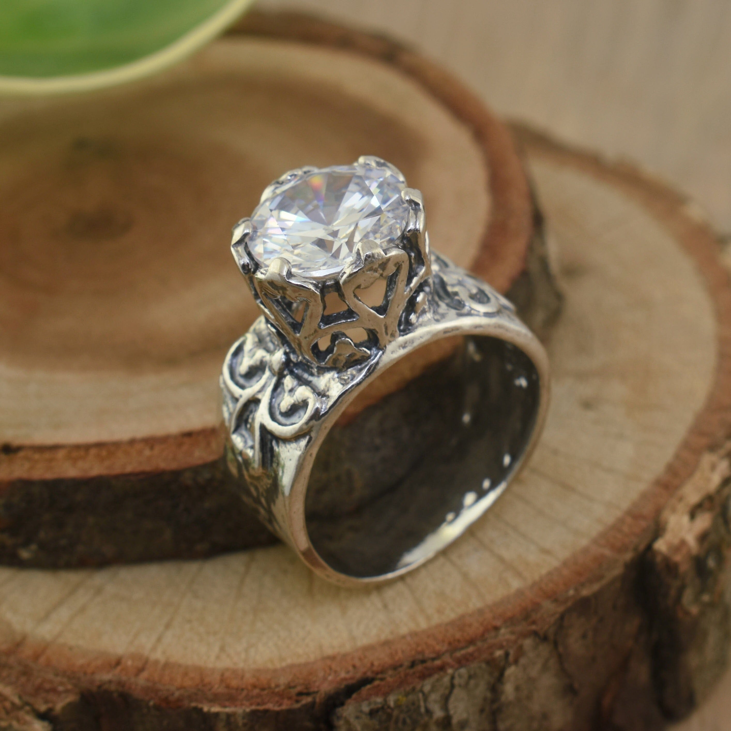 Hammered sterlings ilver ring with round cut cz stone