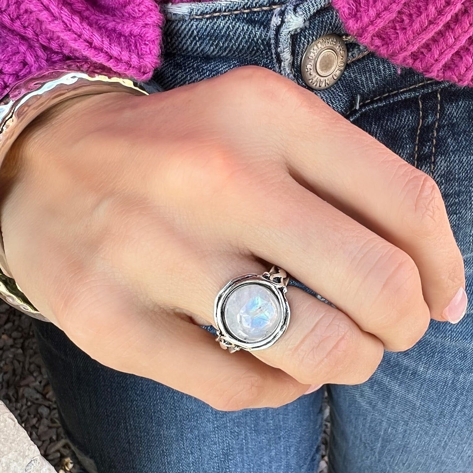oxidized silver ring featuring a round moonstone center