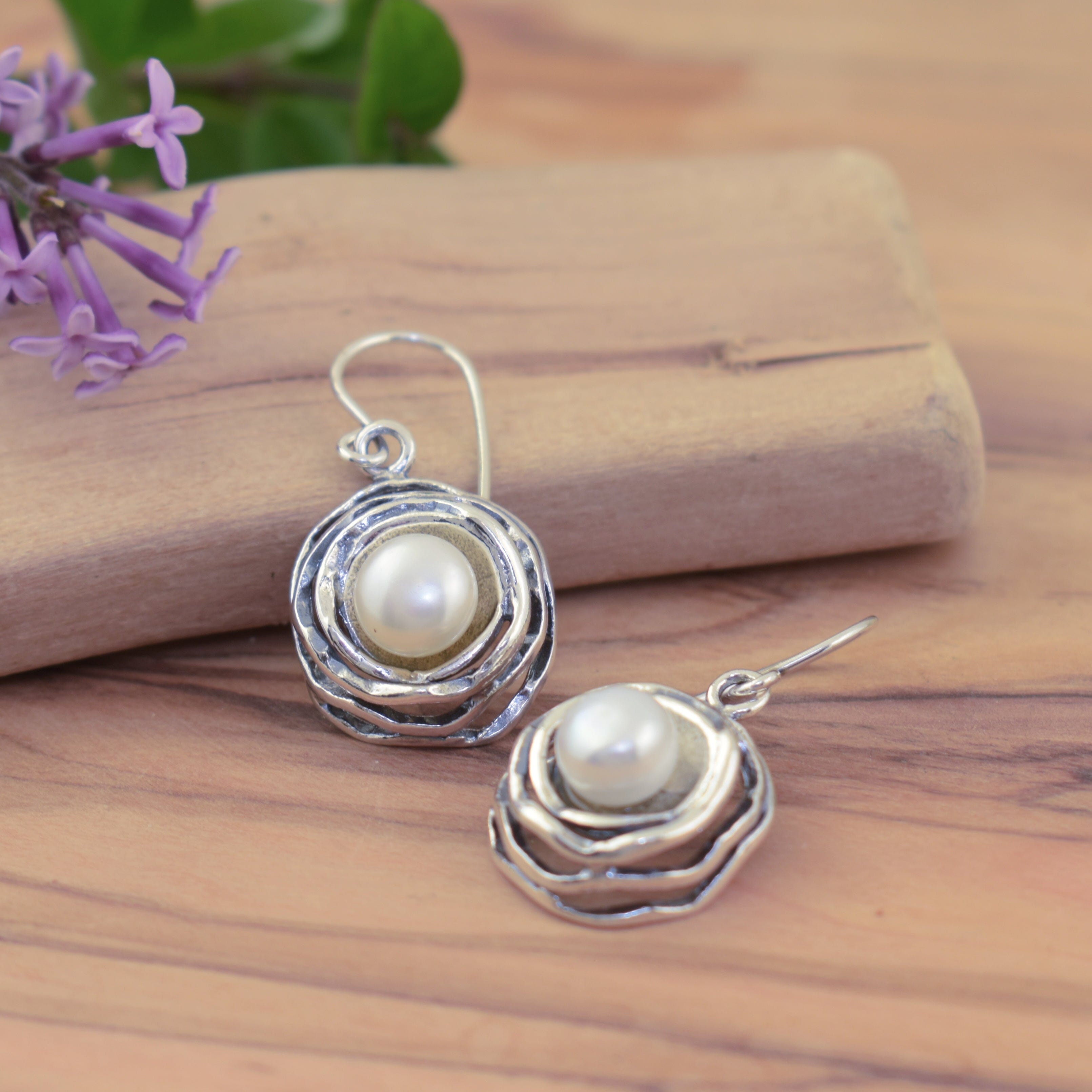 .925 sterling silver and pearl earrings with organic wavy design on French wire hooks