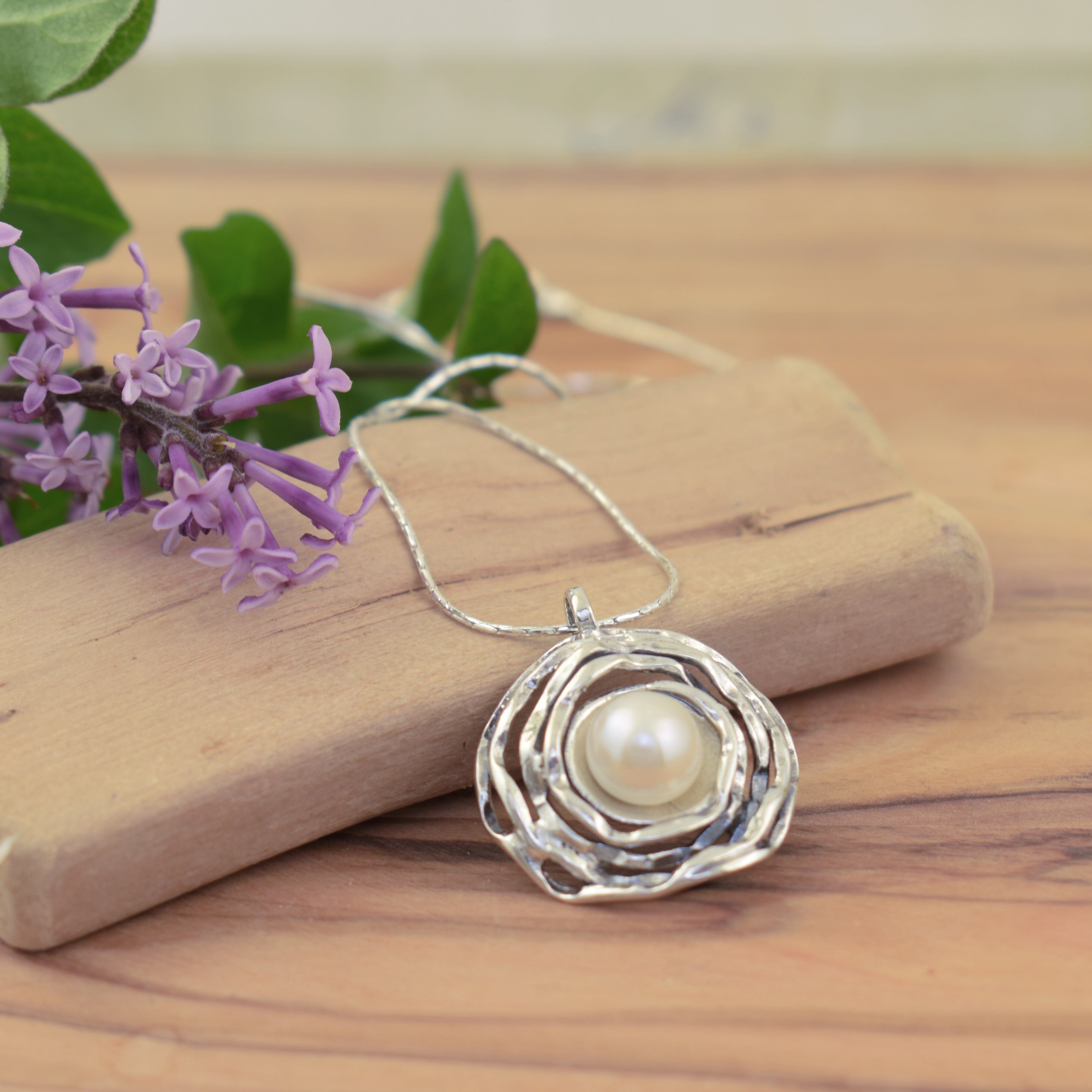 Deigner sterling silver necklace featuring round freshwater pearl