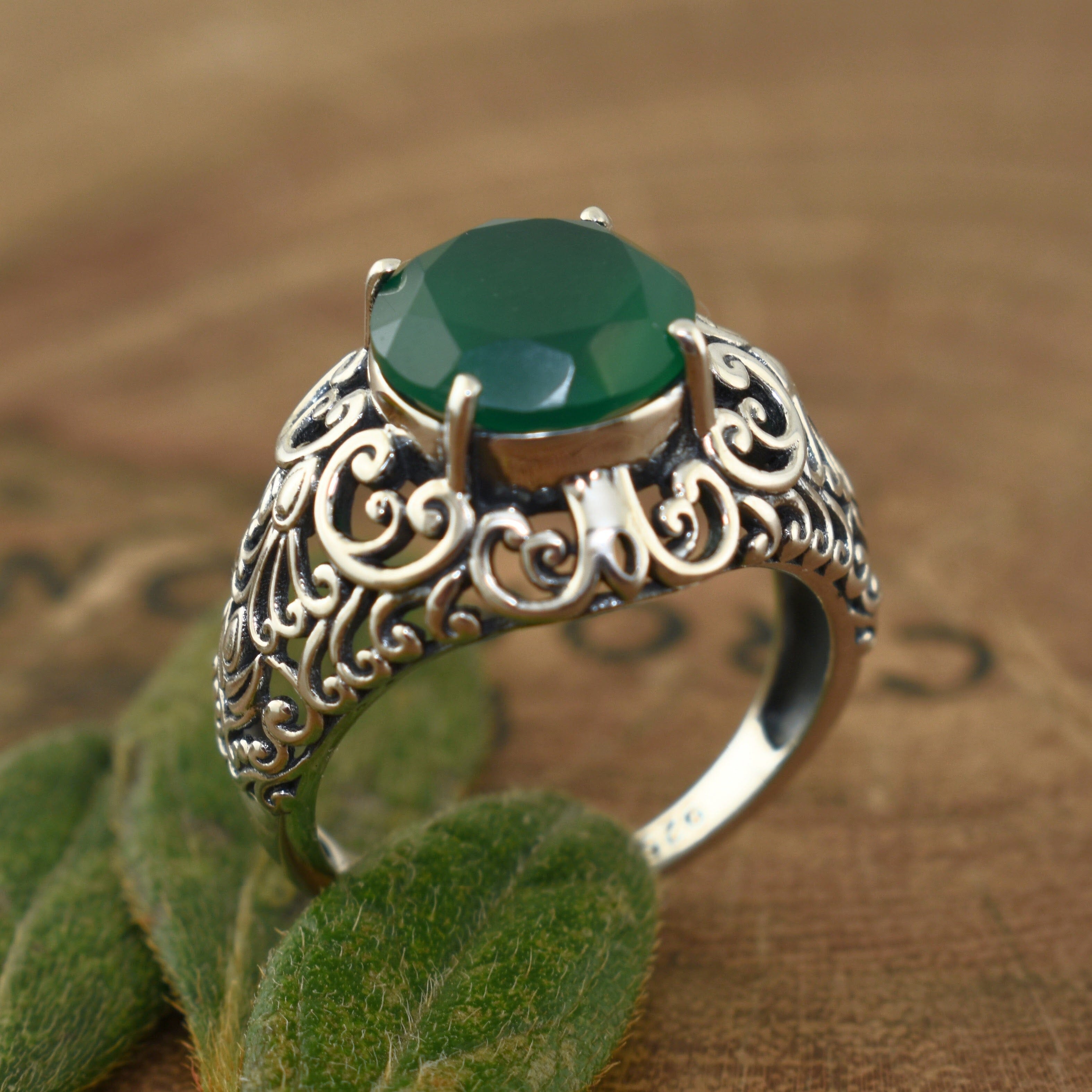 Handcrafted sterling silver ring with round green onyx stone