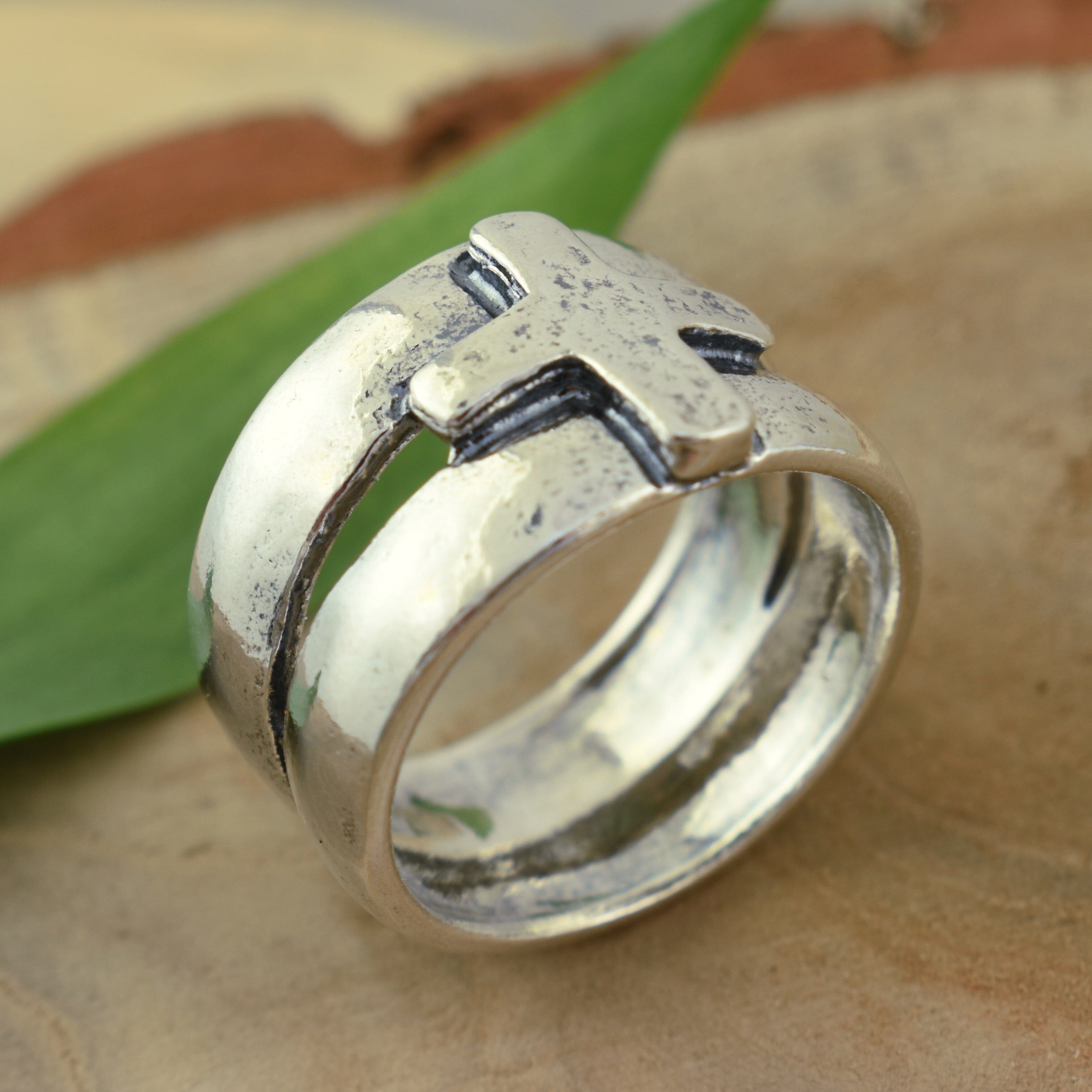 women's Christian ring featuring a cross in the center