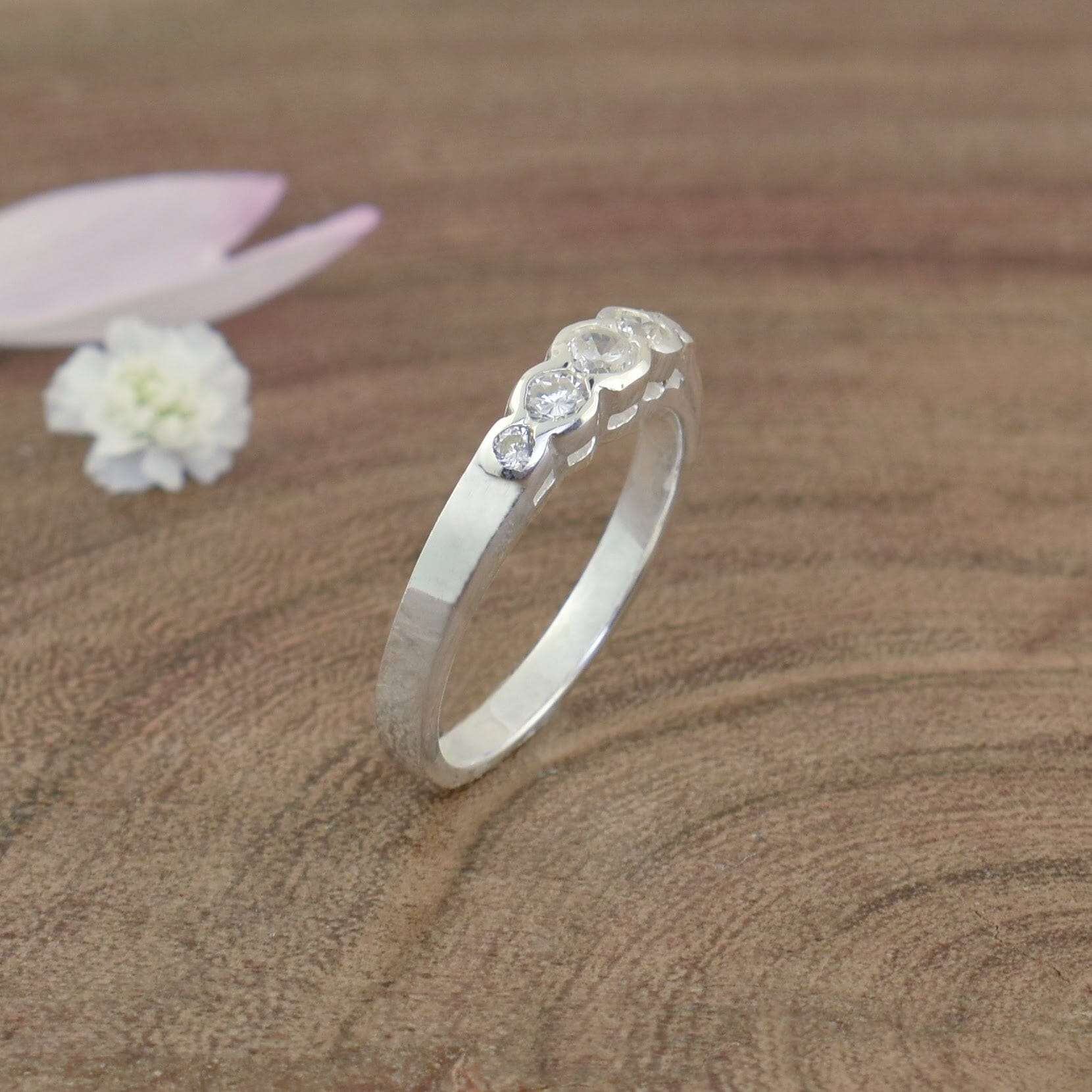 .925 sterling silver ring featuring five cubic zirconia