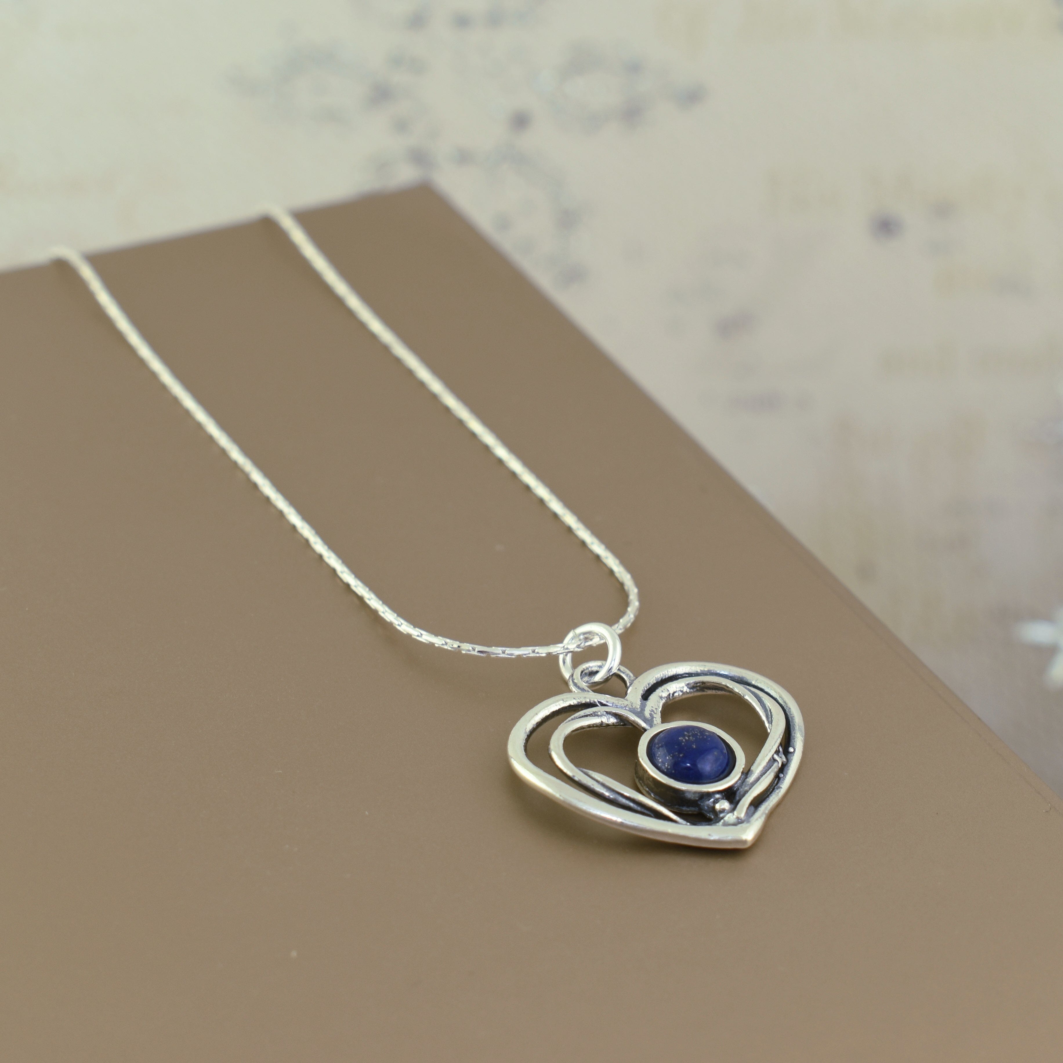 .925 sterling silver heart necklace with blue lapis stone