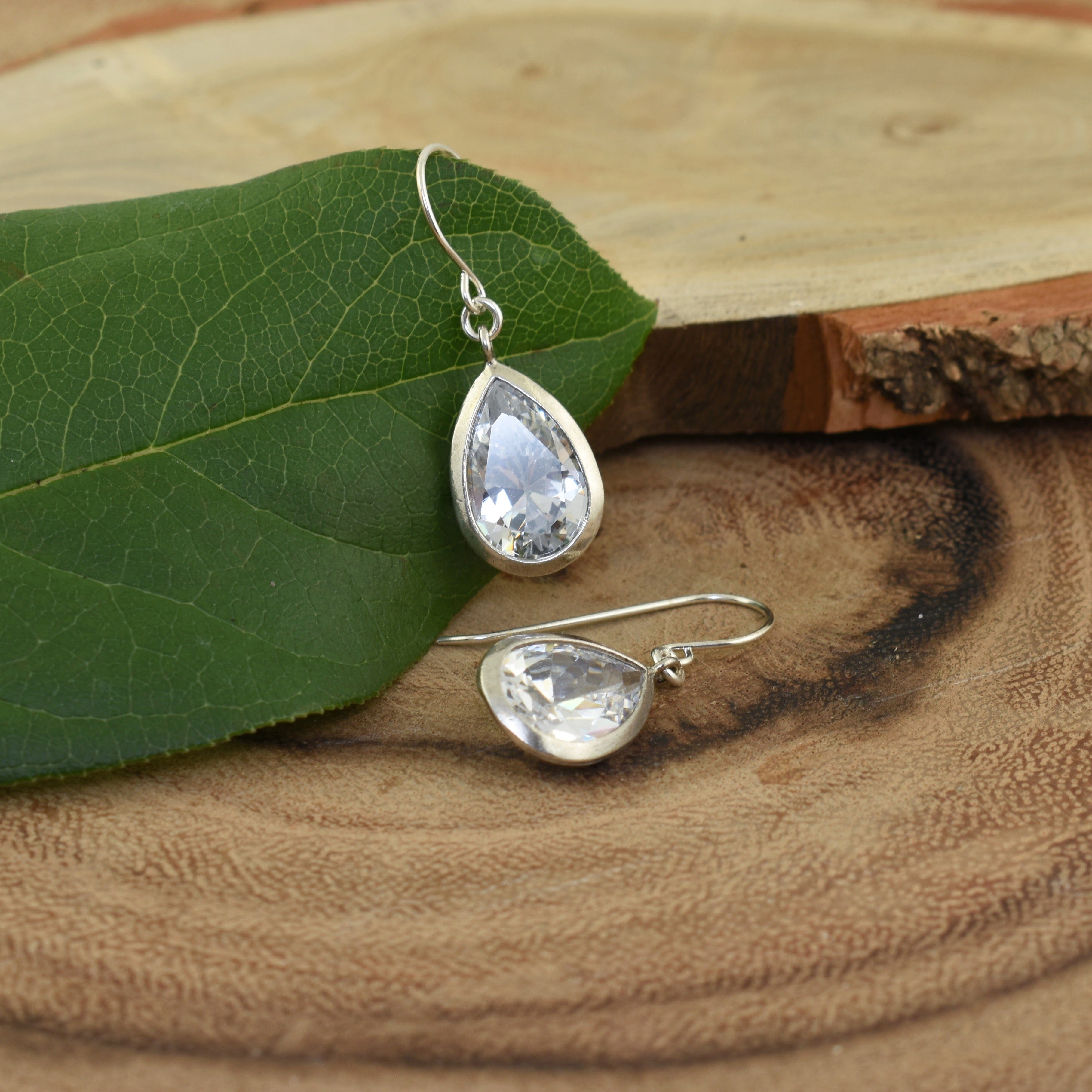 pear shaped dangling earrings in sterling silver