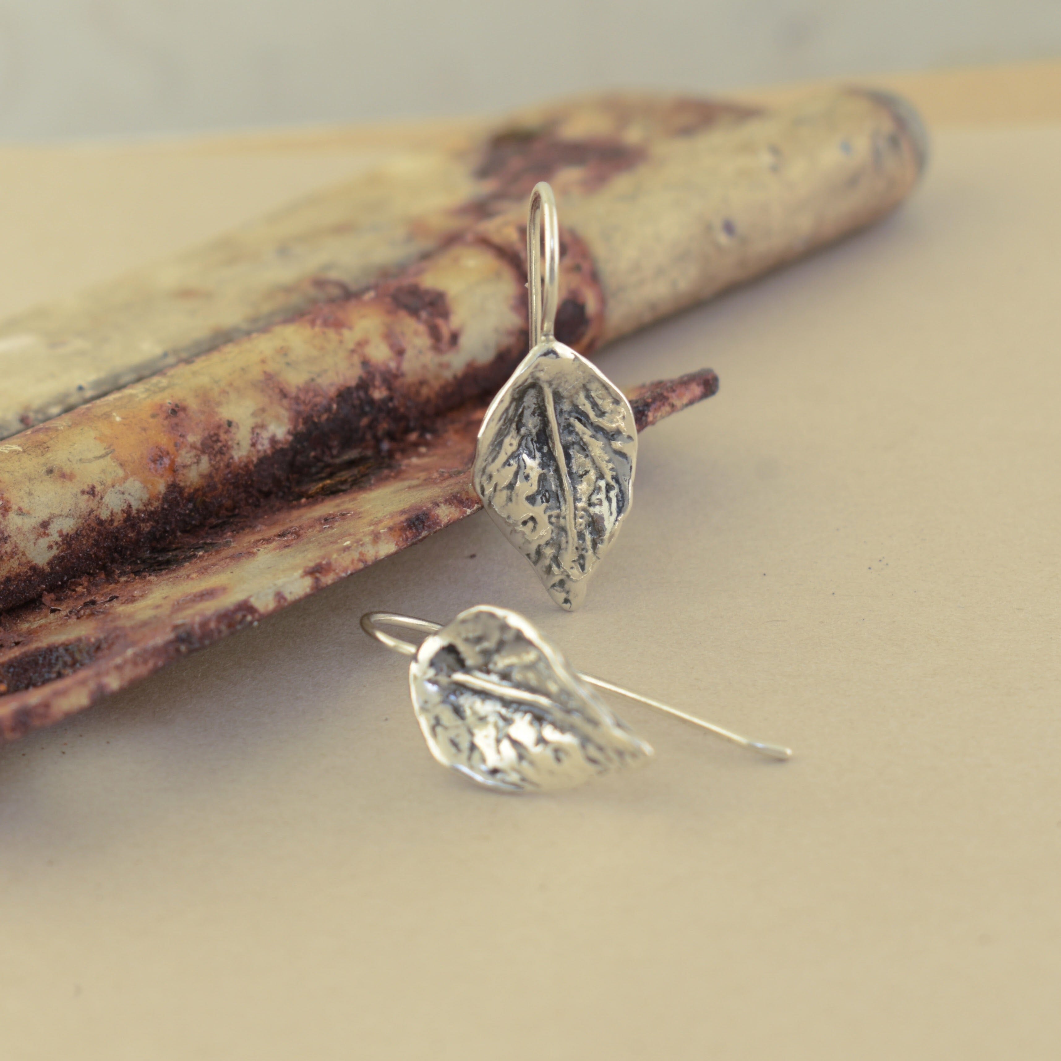 Handcrafted sterling silver leaf earrings with hook backs