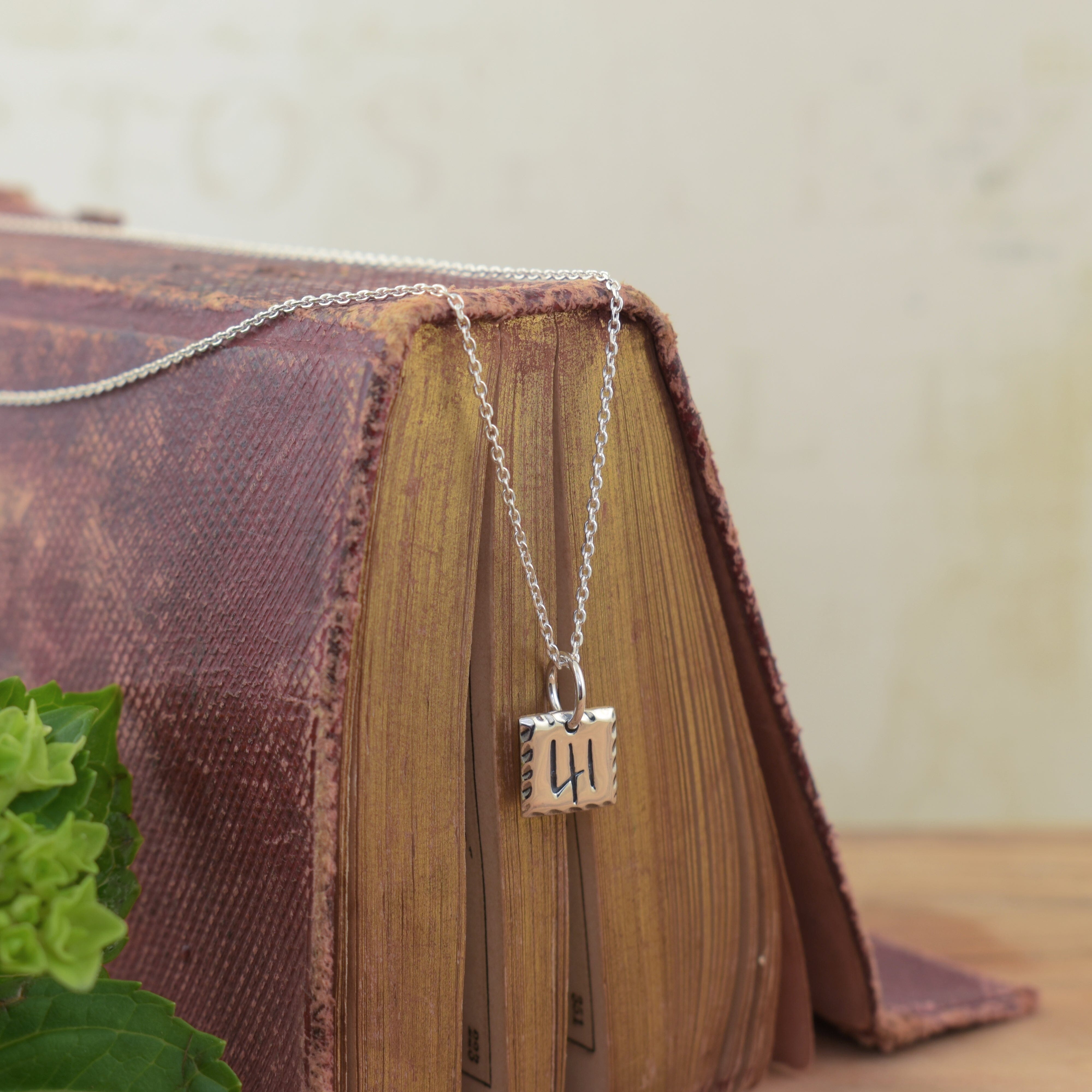 Handcrafted sterling silver necklace featuring number 41 referencing don't give up at 40, your 41 is coming!