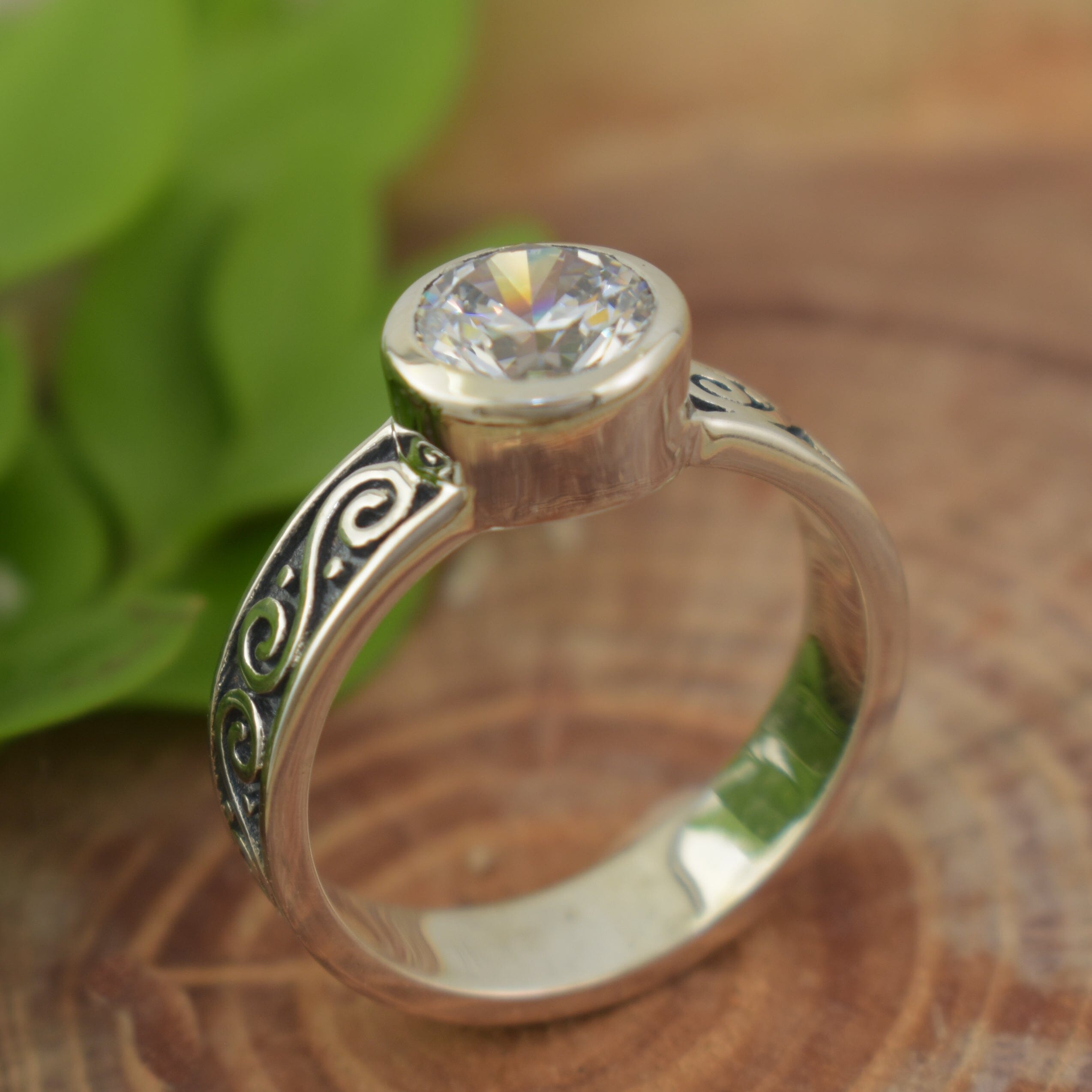 Designer sterling silver and CZ ring with swirled design