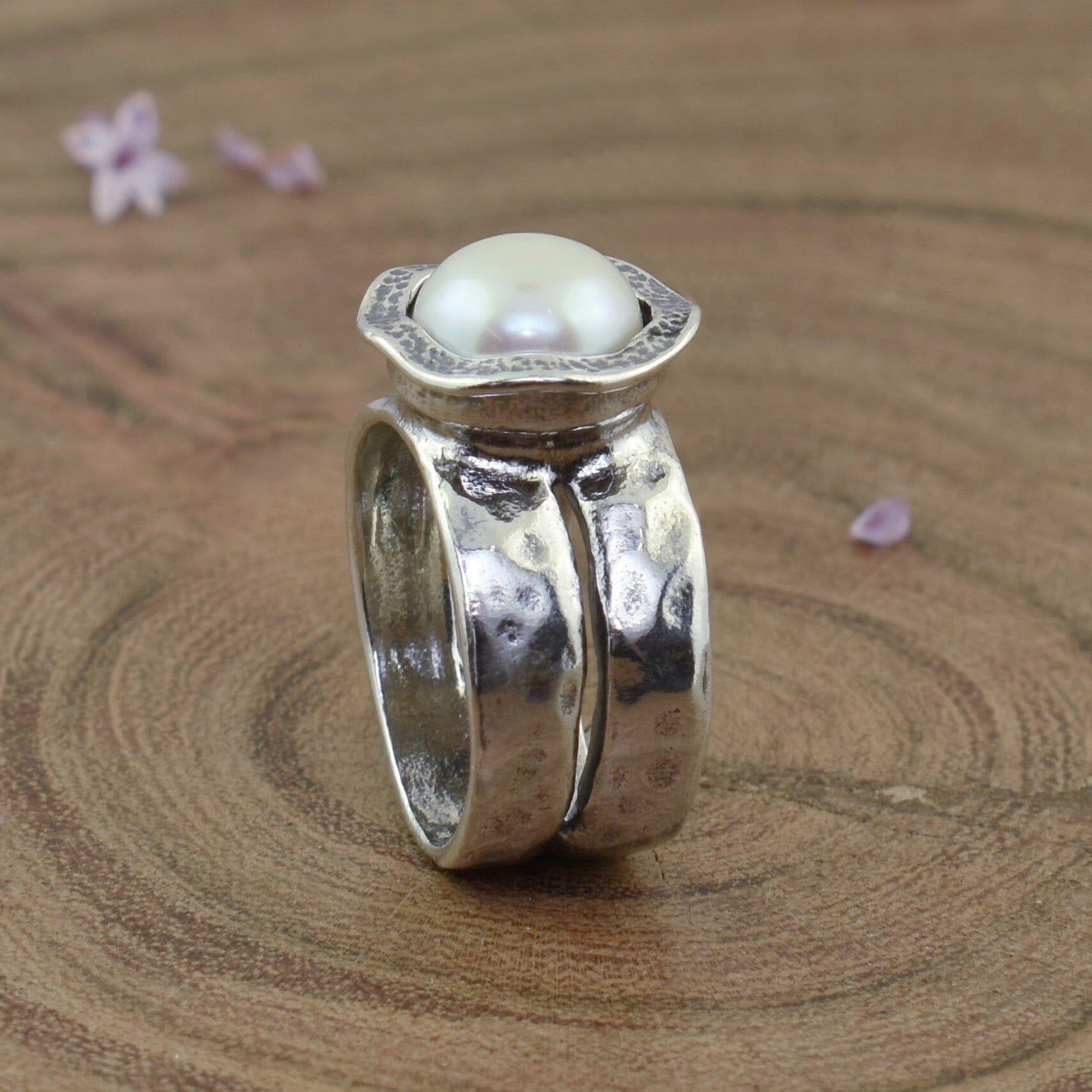 chunky pearl ring with two bands that connect in the back