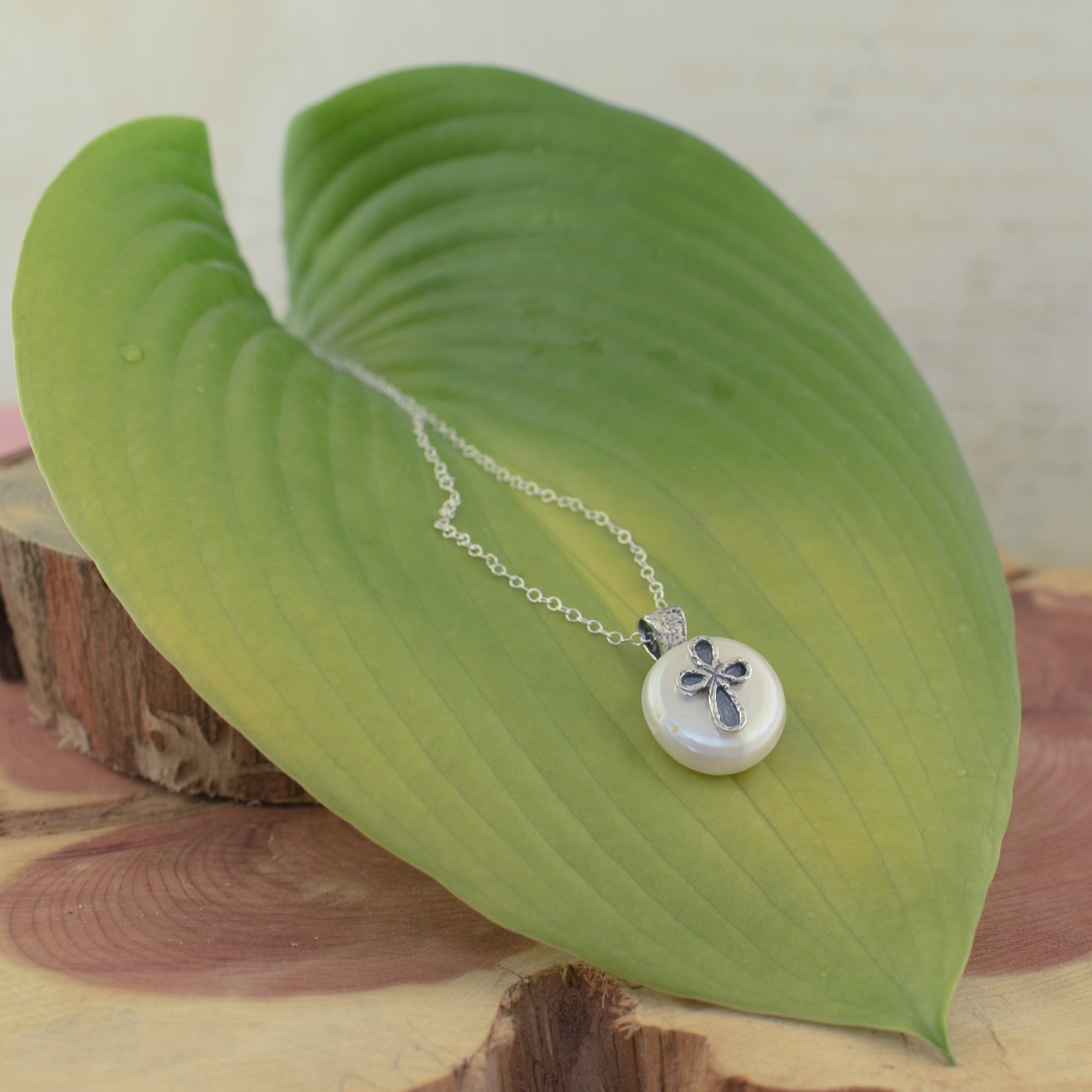 high polished oxidized sterling silver with a freshwater pearl