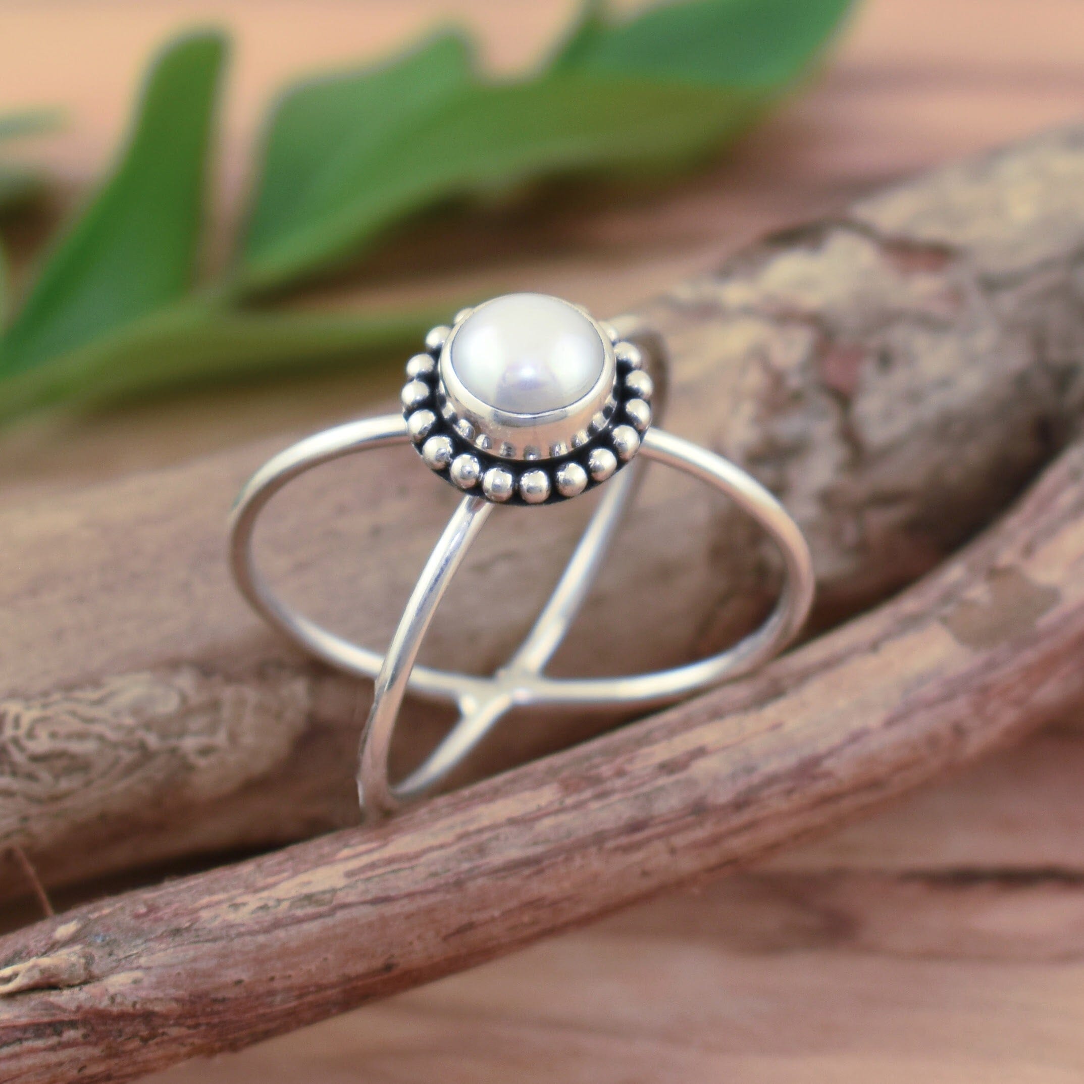 Pearl Orbit in handcrafted sterling silver and pearl