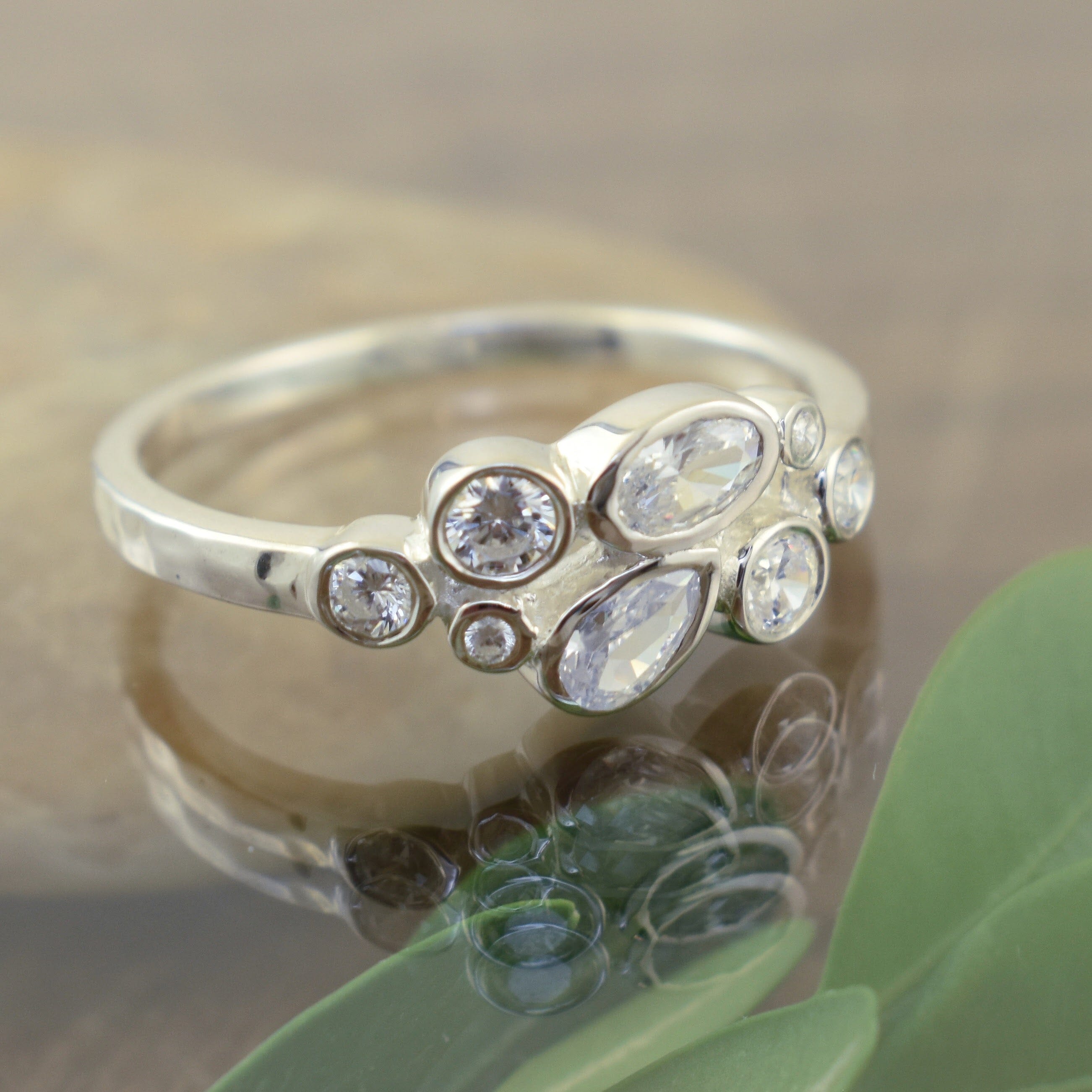 dainty silver ring with a variety of cz stones