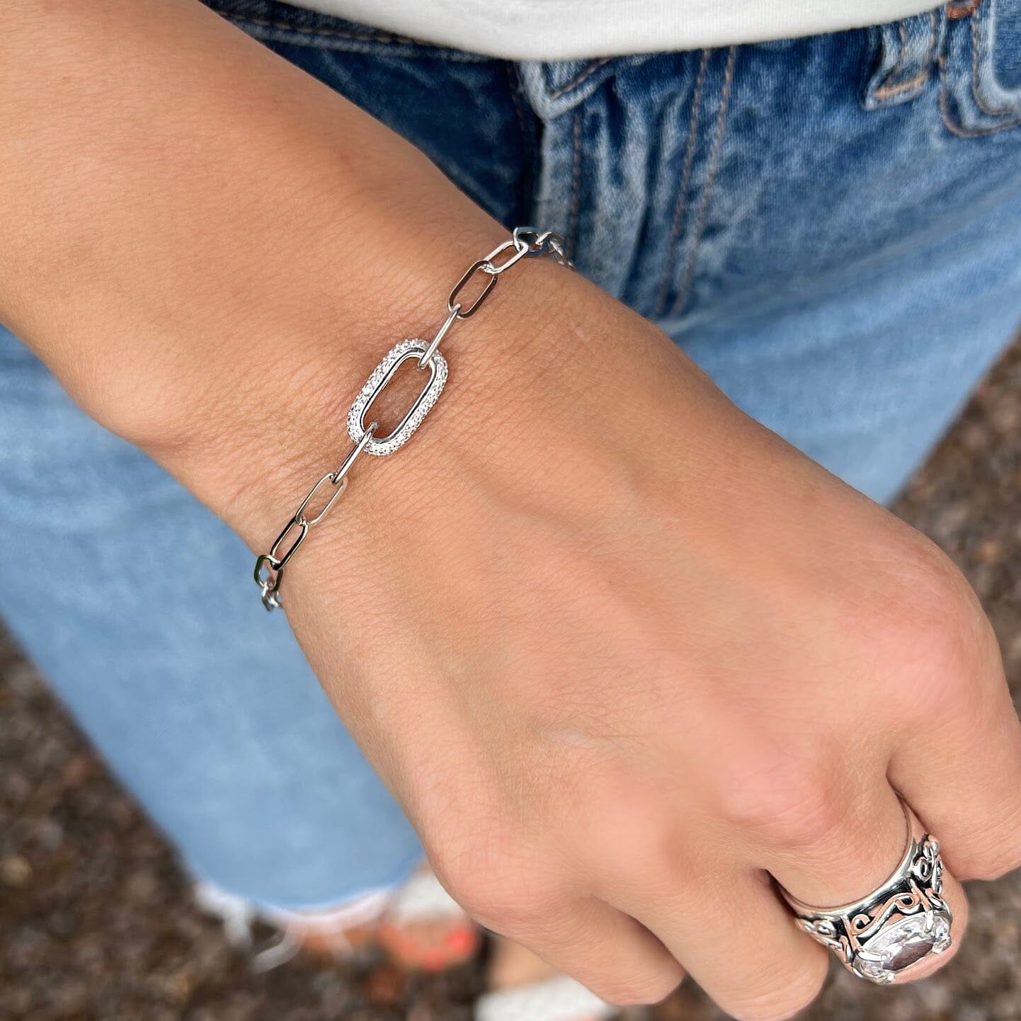 paperclip chain bracelet featuring a paved-studded paperclip link with cz stones