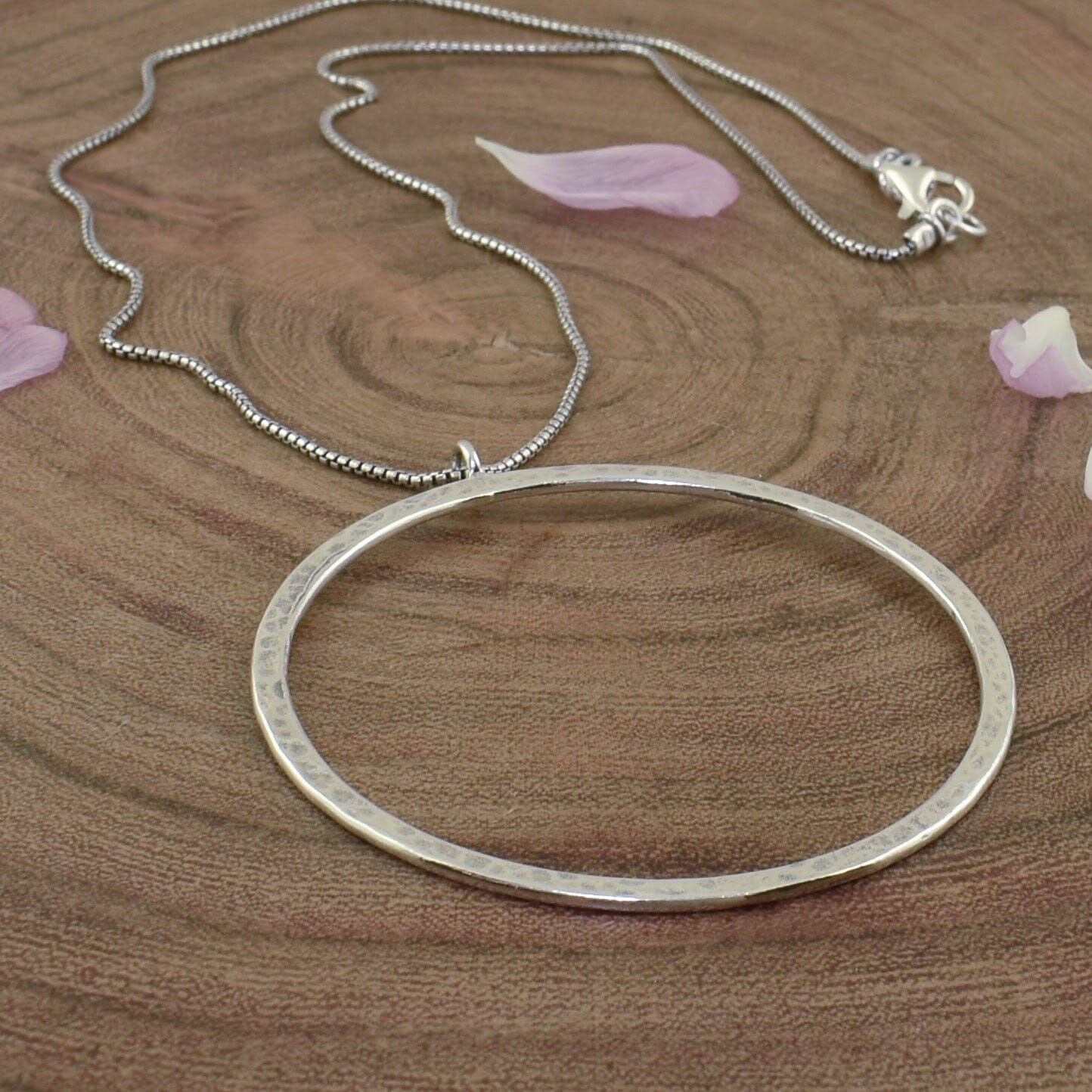 .925 sterling silver necklace featuring a large round pendant