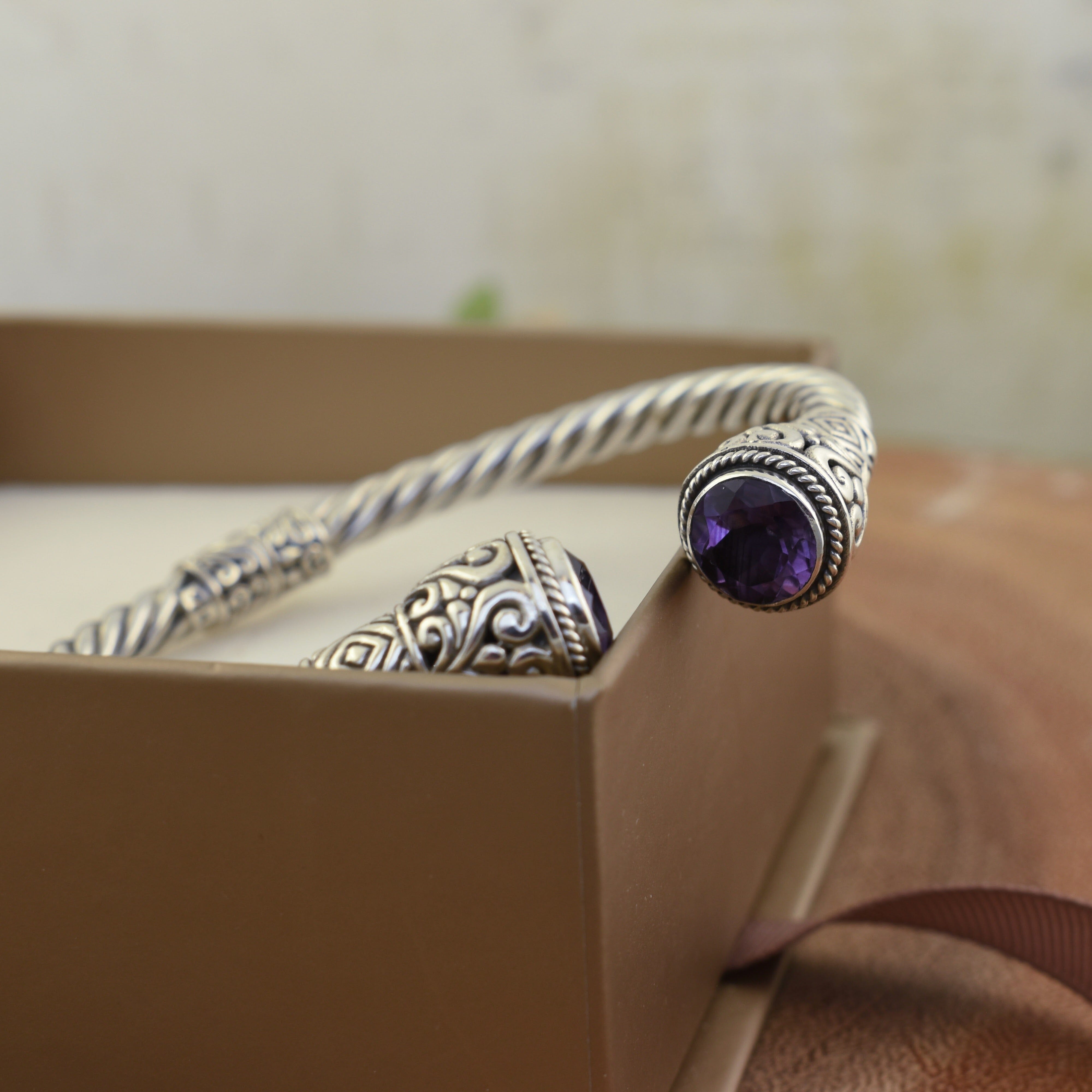 Twisted sterling silver cuff with purple amethyst