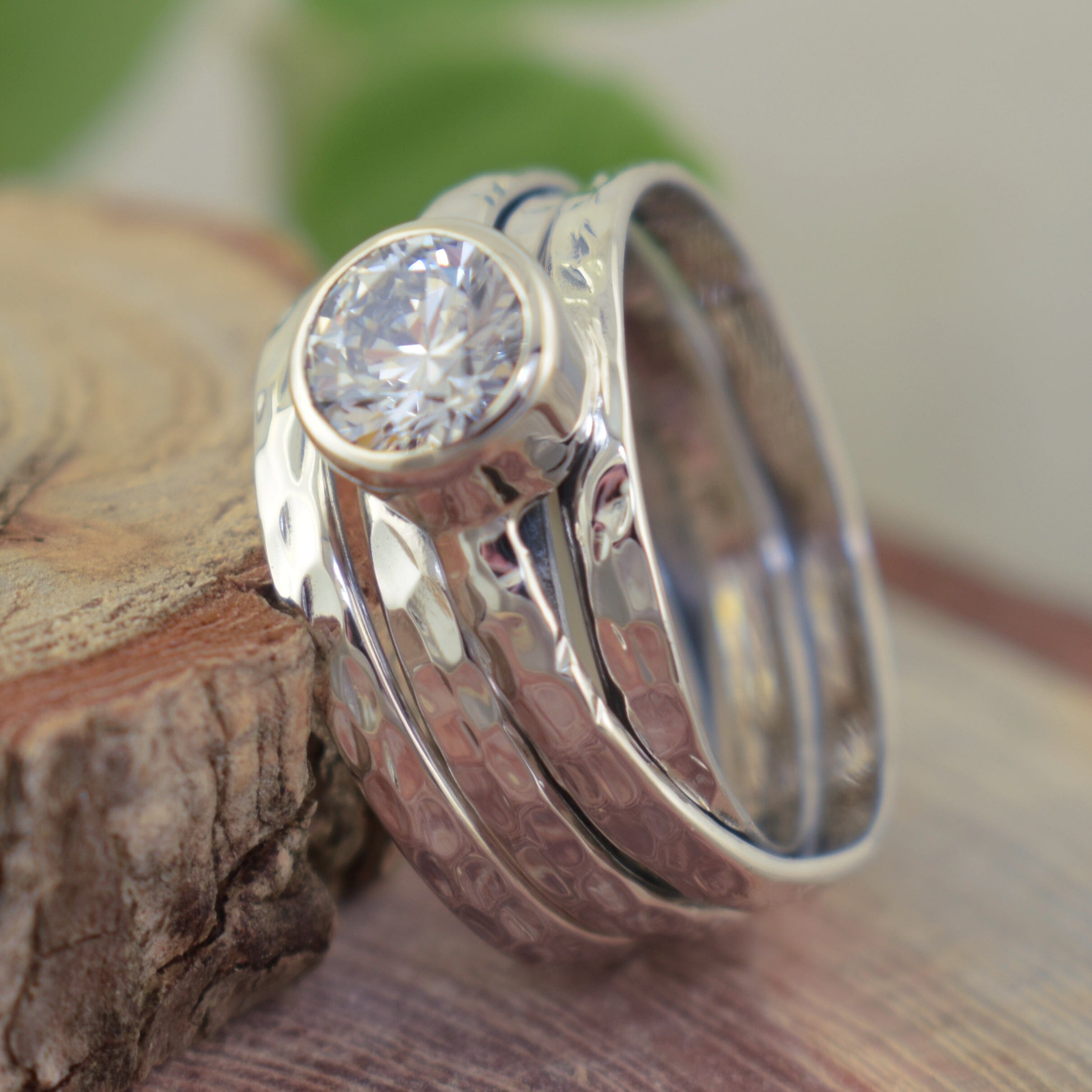 Hammered sterling silver ring with spinner look and cz stone