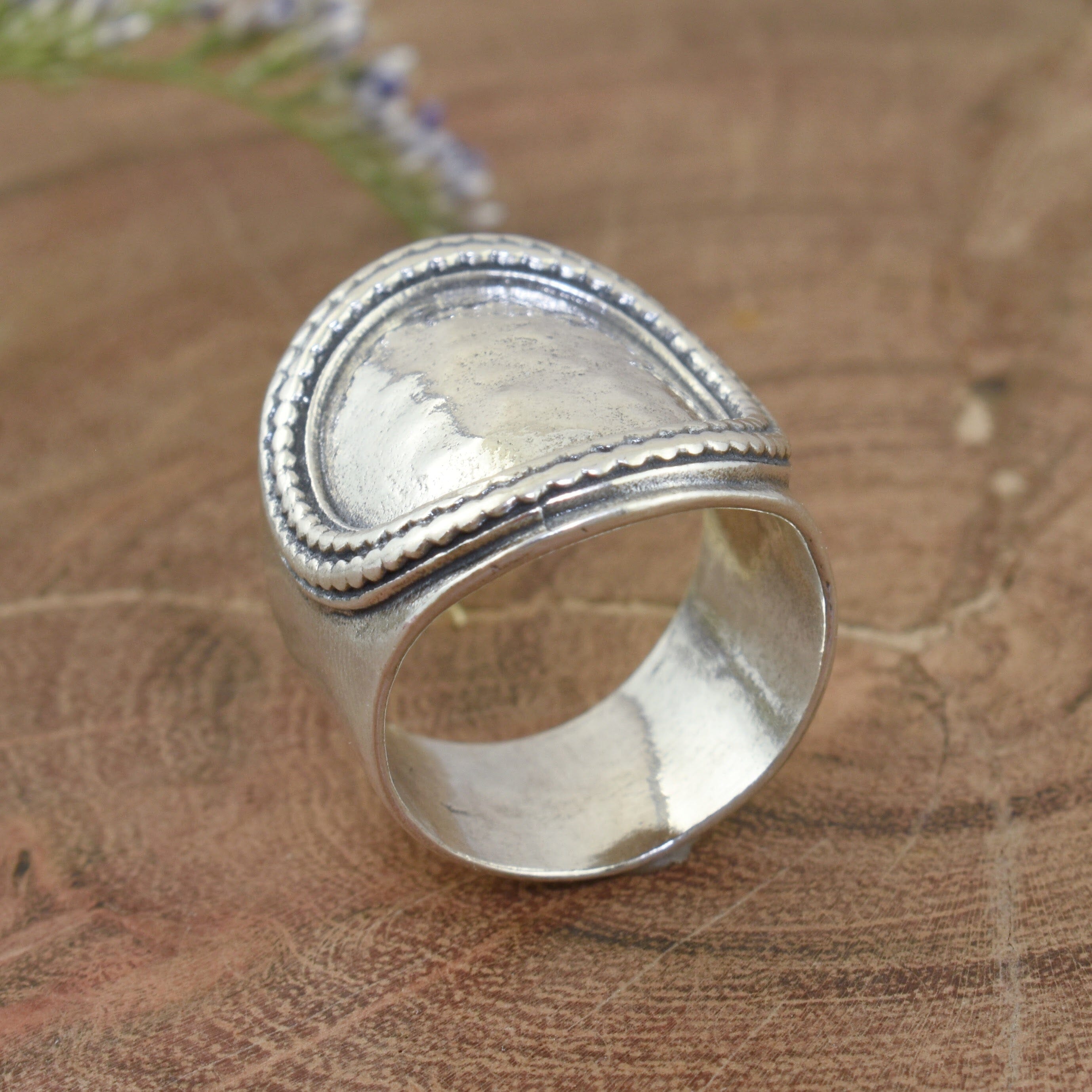 .925 sterling silver saddle ring with a decorative frame