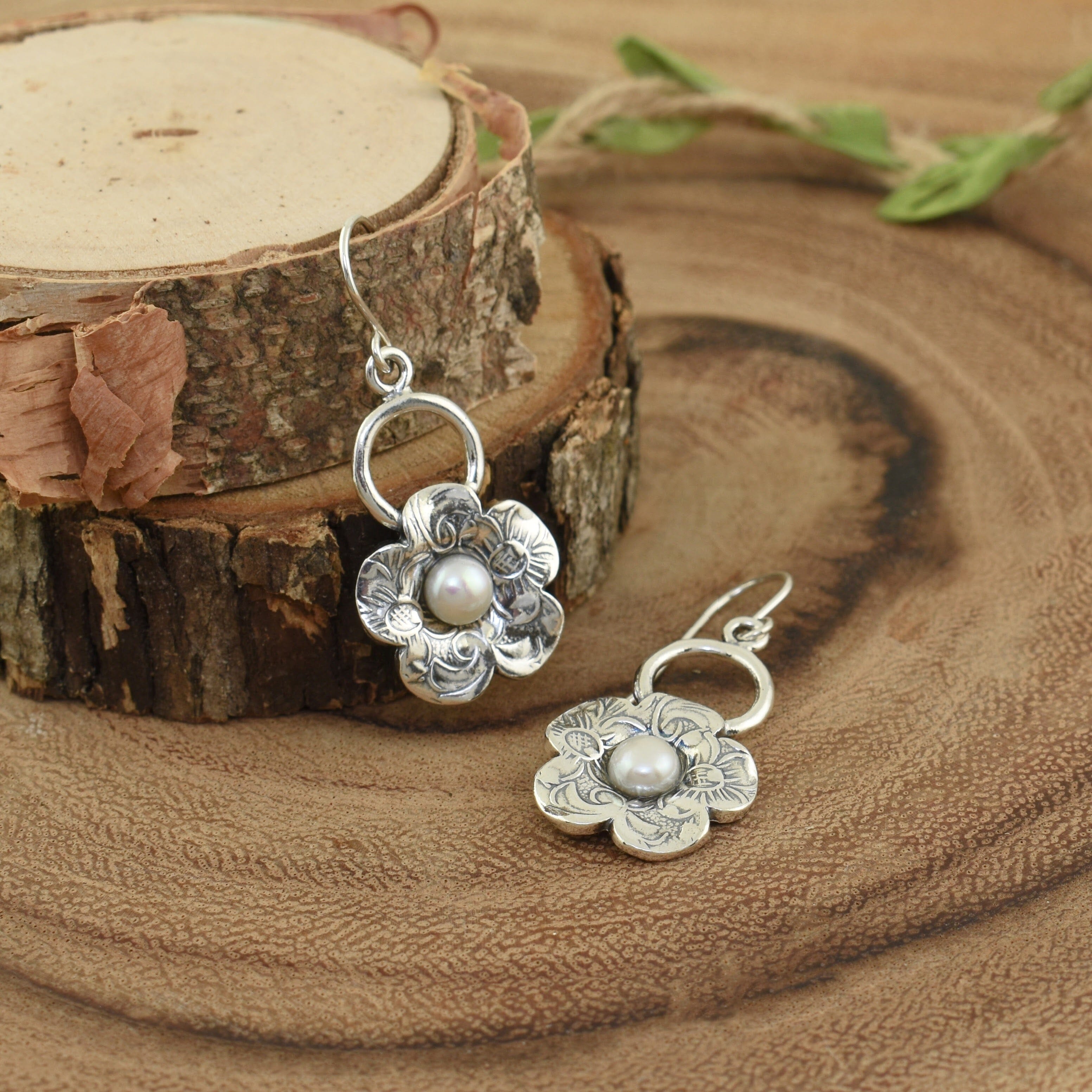 silver flower earrings with freshwater pearl center