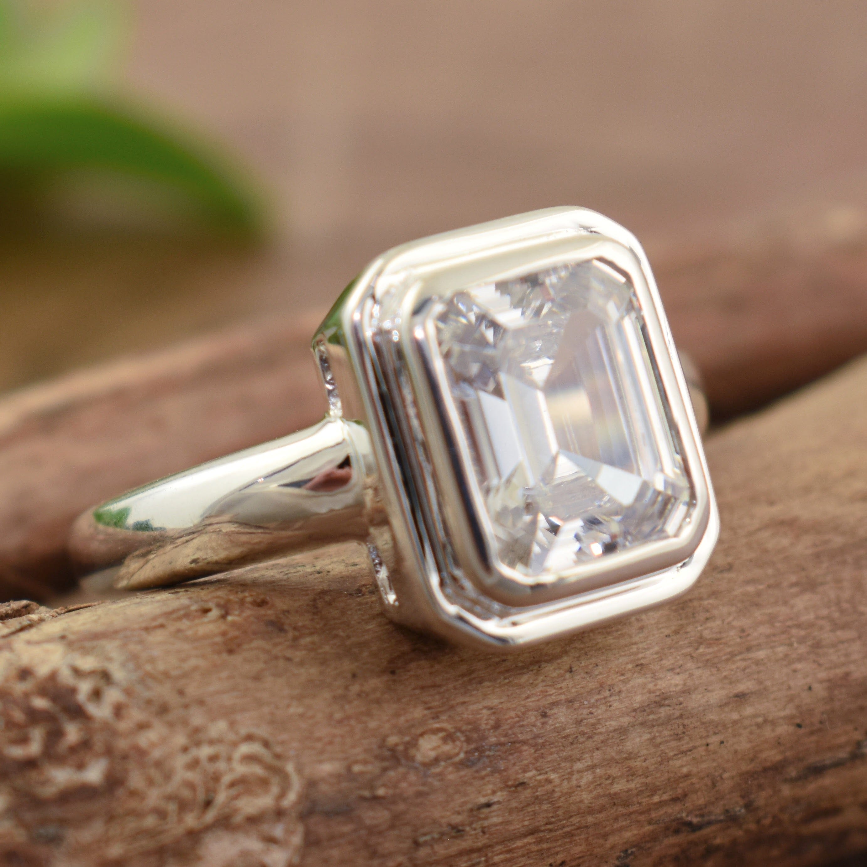 Handcrafted sterling silver ring with emerald cut cubic zirconia